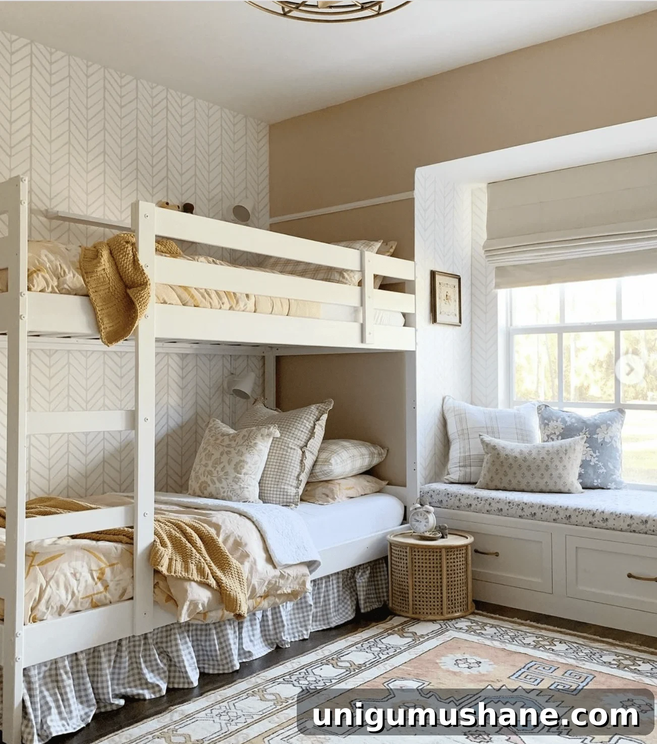 Space-Saving Bunk Bed Ideas for Small Bedrooms 11 blush pink shared bedroom for girls with eclectic bedding