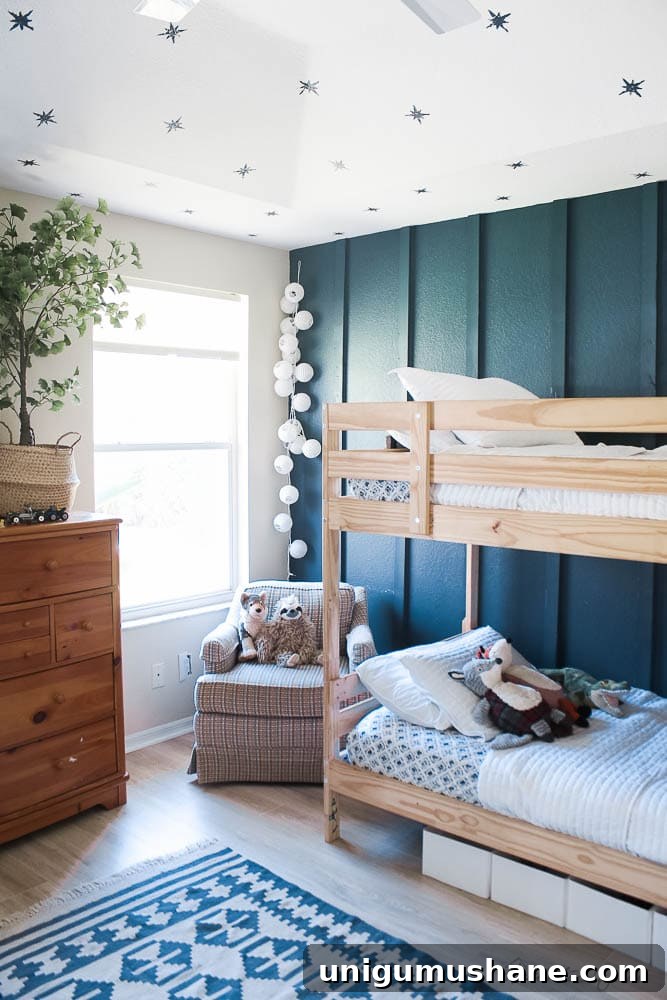 Space-Saving Bunk Bed Ideas for Small Bedrooms 20 board and batten wall in a small bedroom with wallpaper ceiling