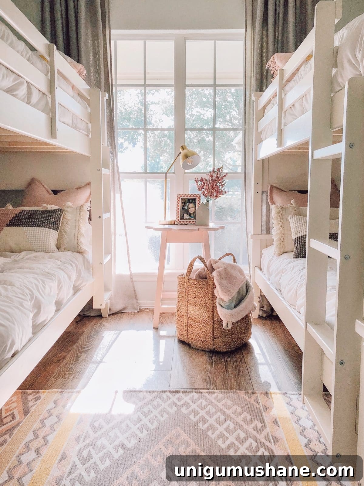 Space-Saving Bunk Bed Ideas for Small Bedrooms 8 two bunk beds framing a window for a 4 person shared bedroom