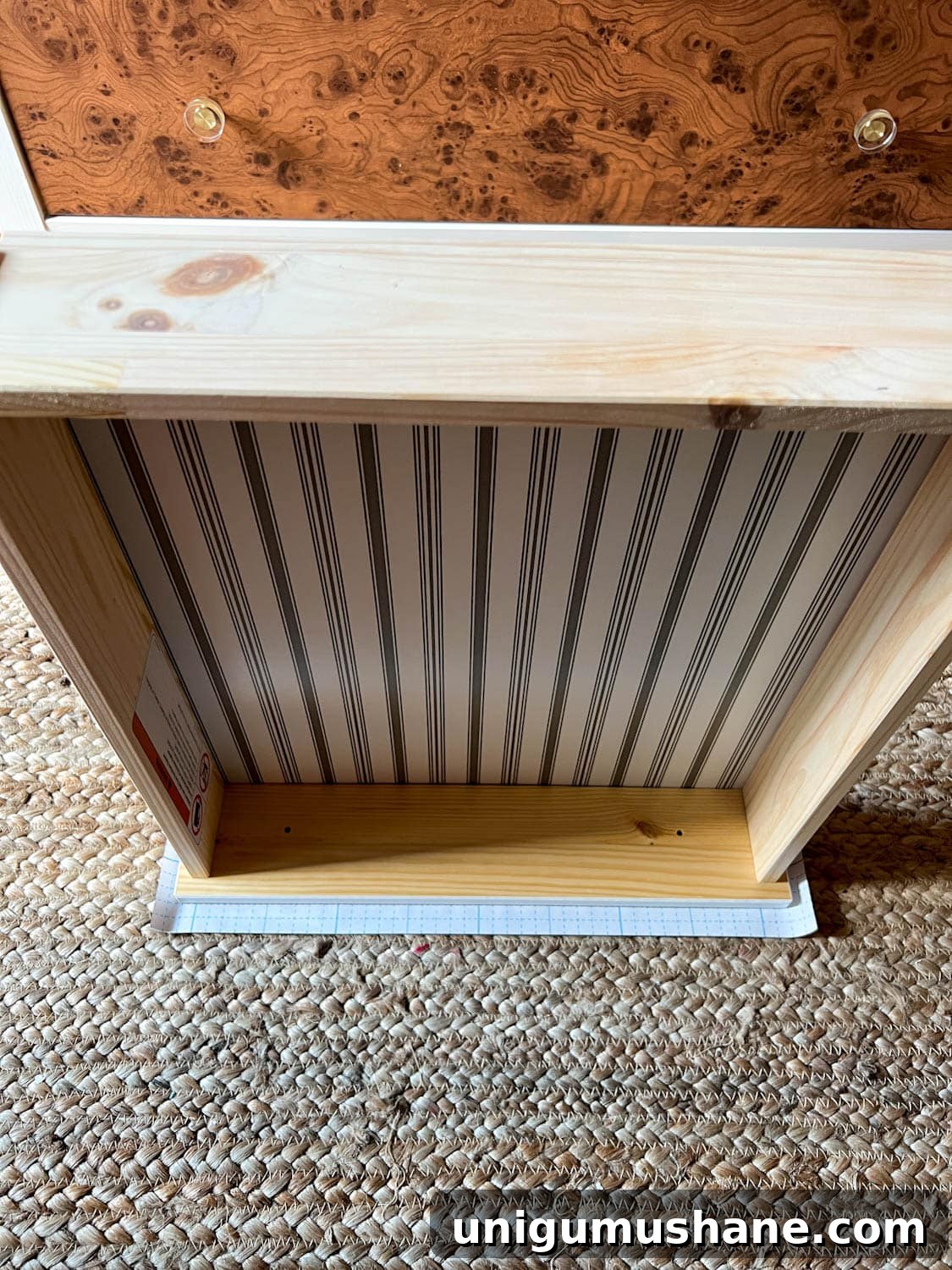Transform an IKEA Dresser with Burl Wood Contact Paper 6 cutting contact paper for a dresser drawer front