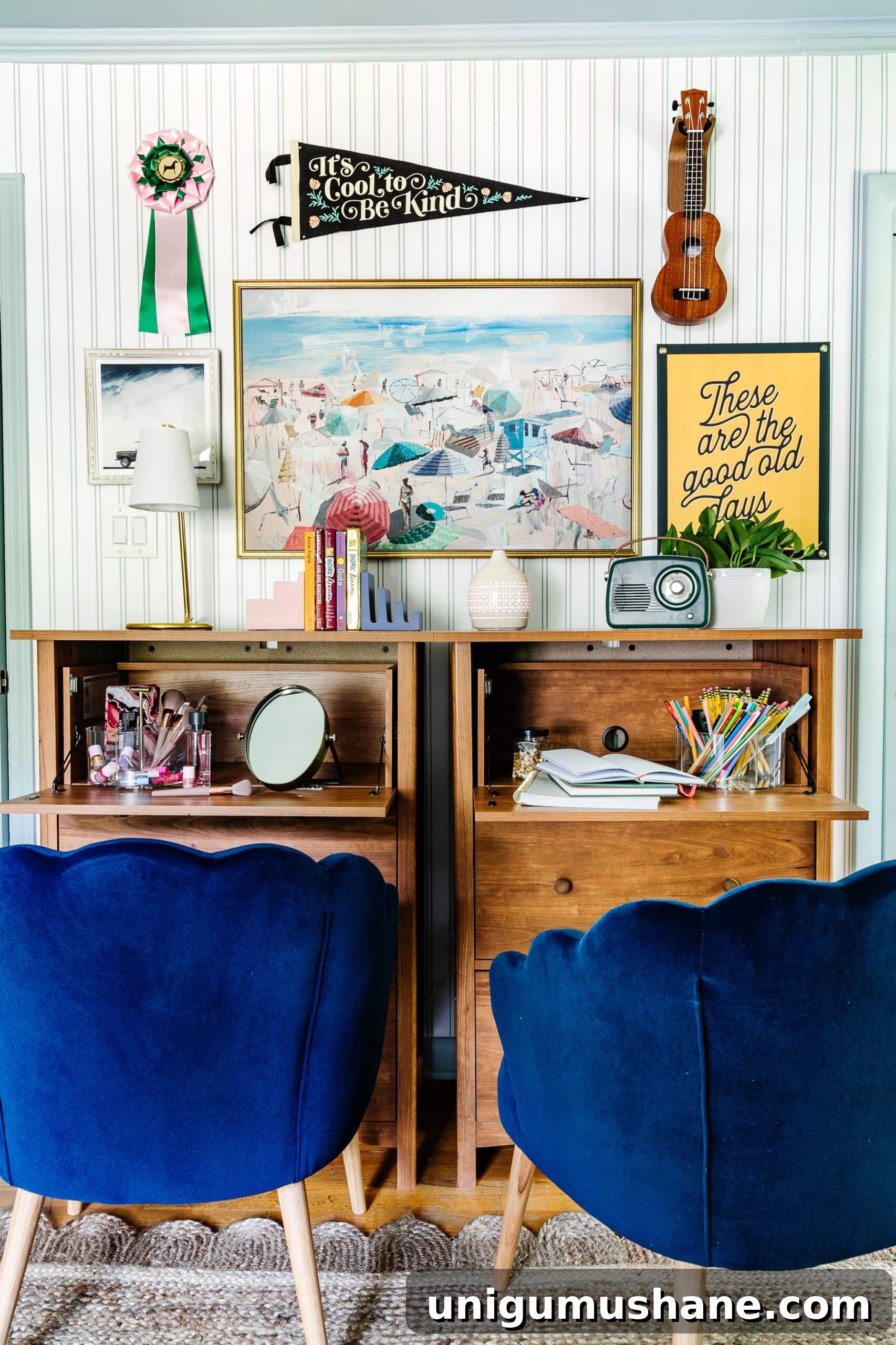 Beach-Themed Triple Bunk Bed Makeover for Teens 15 beach bedroom gallery wall with camp art and coastal paintings behind bedroom desks