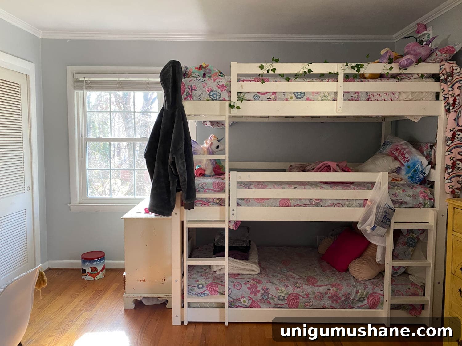 Beach-Themed Triple Bunk Bed Makeover for Teens 24 triple bunk bed in shared teenage bedroom before