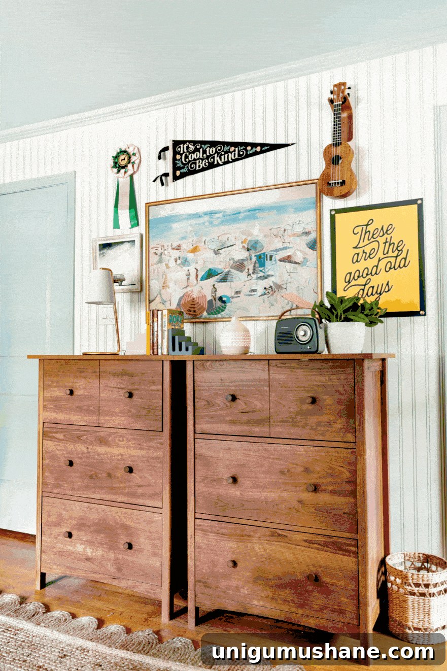 Beach-Themed Triple Bunk Bed Makeover for Teens 4 dresser desks in a shared teenage bedroom with camp art and coastal wall decor
