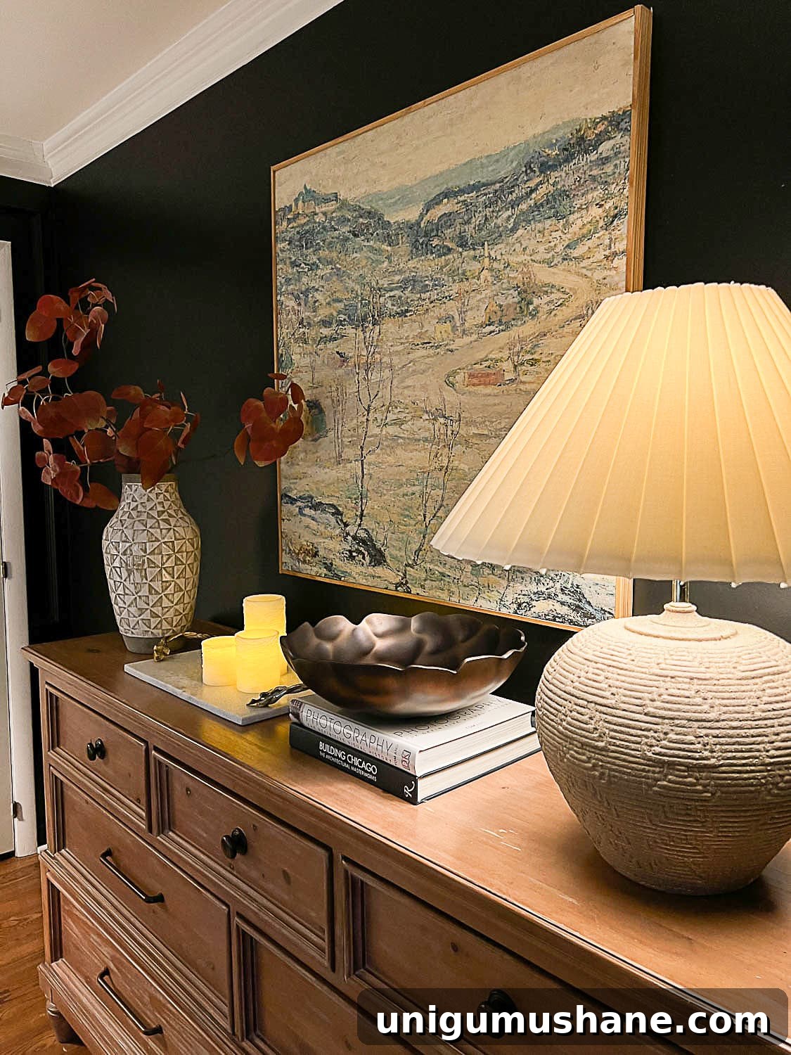10 Affordable Cozy Bedroom Ideas to Improve Sleep 11 fall branches in vase, flameless candles, and table lamp dresser decor