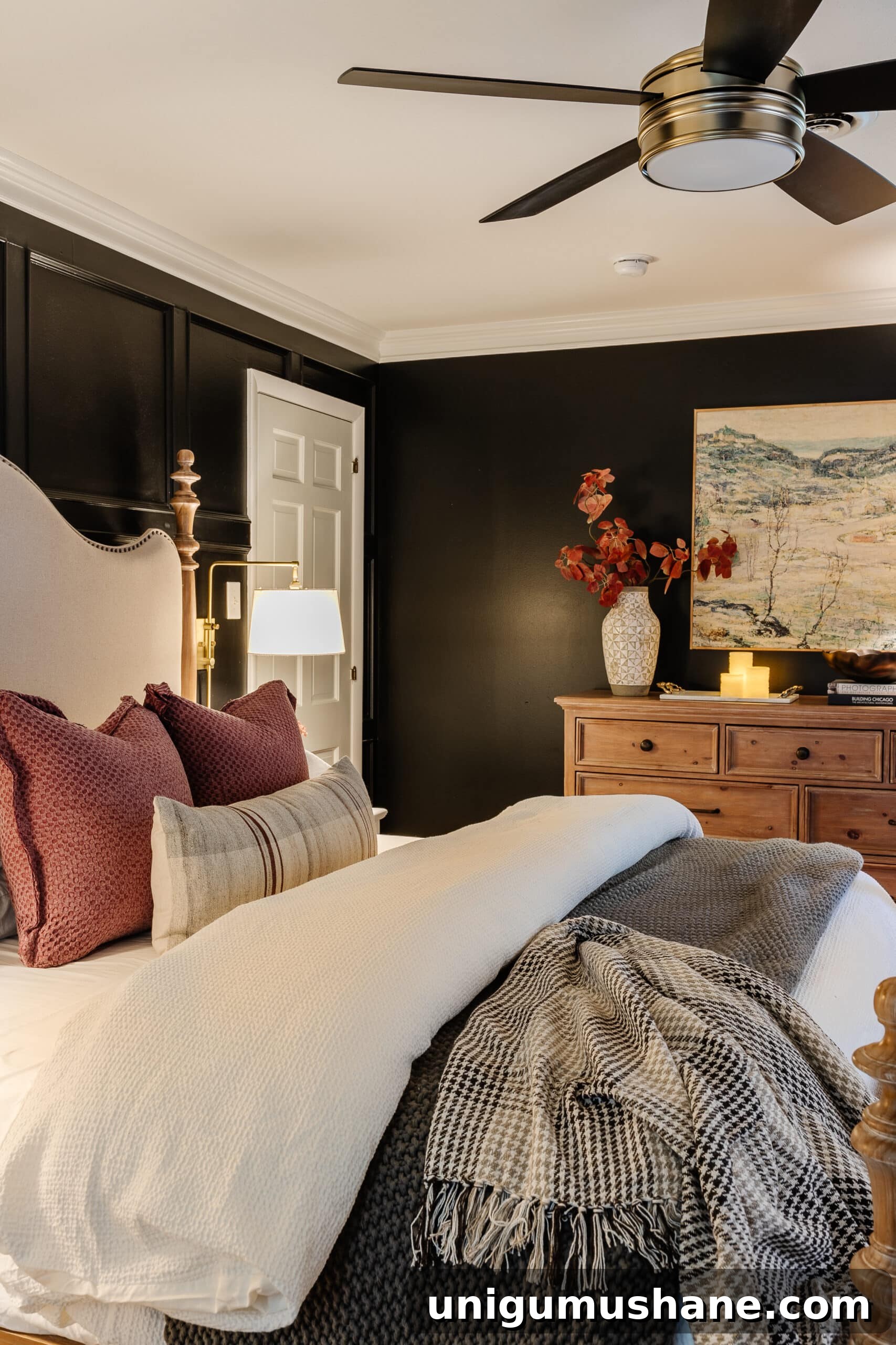 10 Affordable Cozy Bedroom Ideas to Improve Sleep 6 cozy bedroom with lamps, candles, art, and fall decor