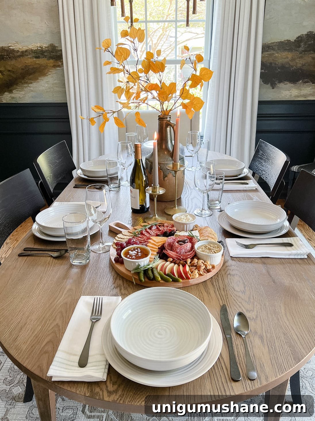 How to Make a 10-Minute DIY Charcuterie Board 11 set dinner table with fall leaves in a vase and candles