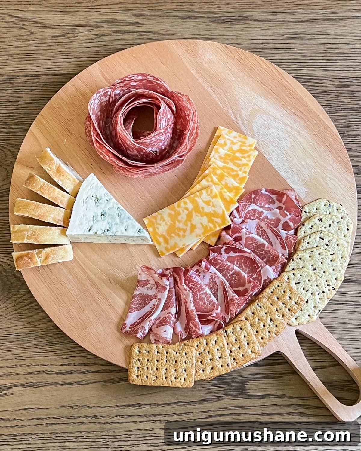 How to Make a 10-Minute DIY Charcuterie Board 6 simple charcuterie board with crackers and bread added