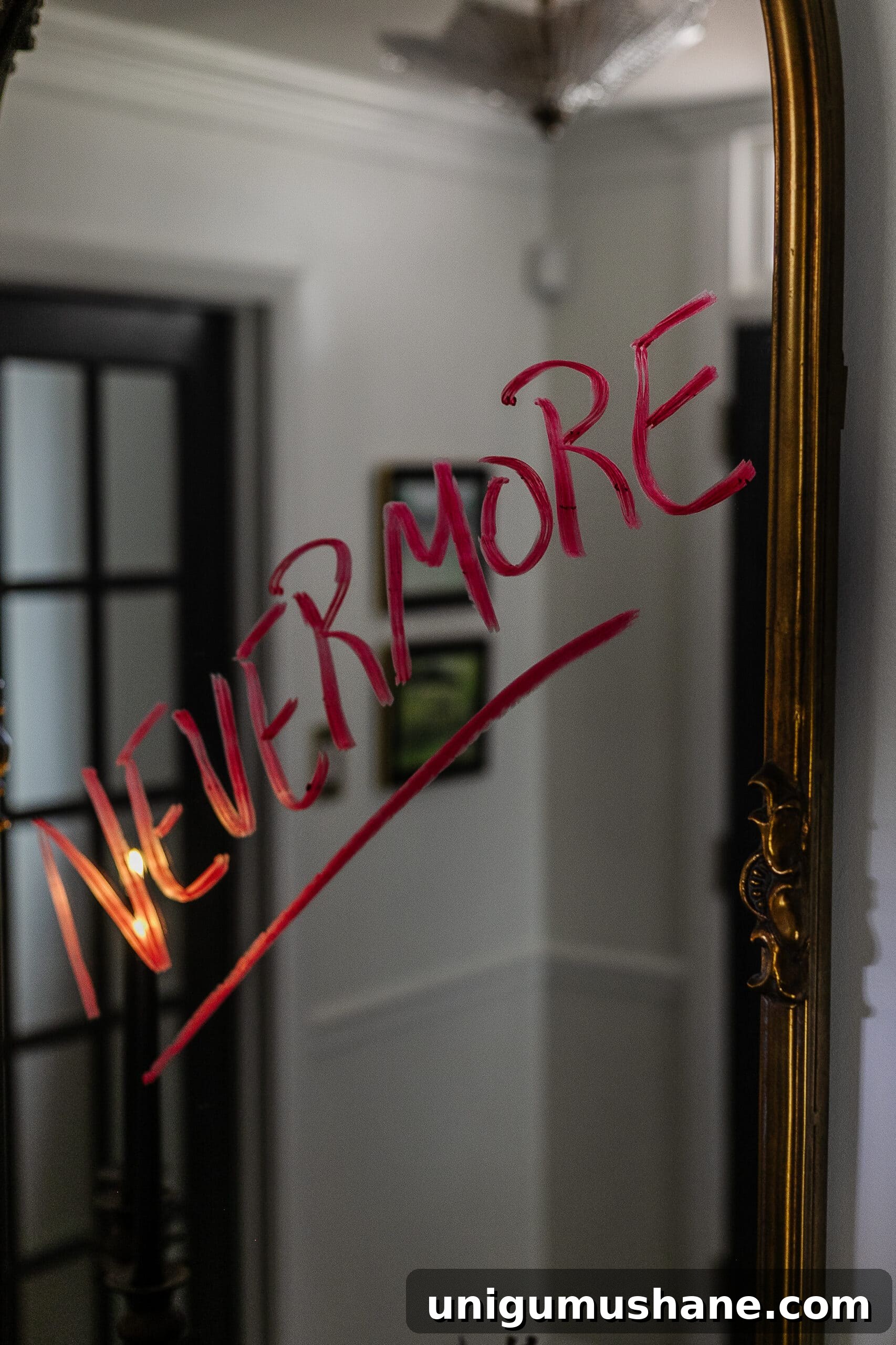 DIY Haunted House Entryway Ideas for Halloween 11 Nevermore written on mirror in red lipstick