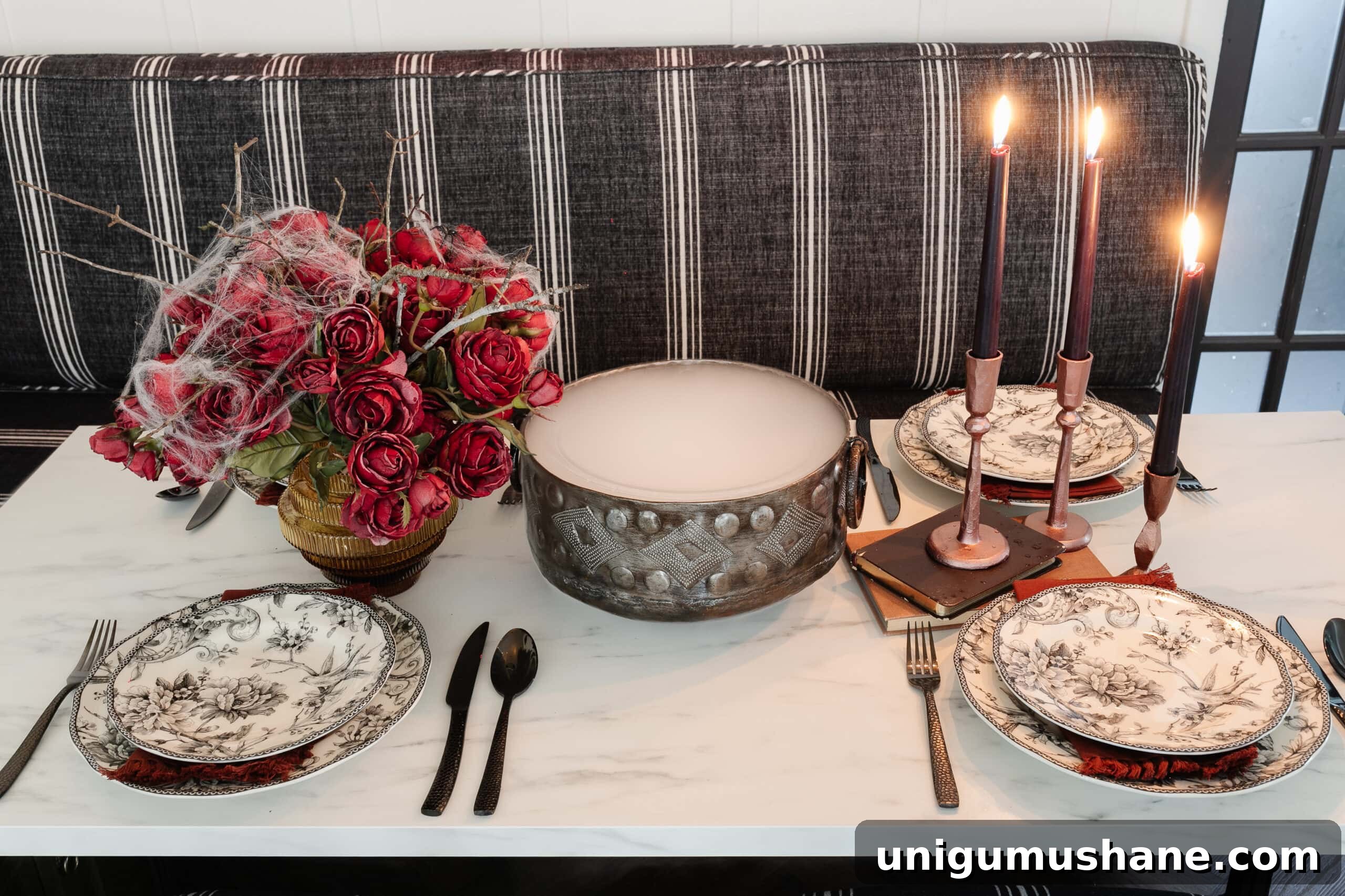 Murder Mystery Party Table Decor Ideas for Halloween 13 Halloween table decor with bowl of dry ice fog, red roses with spider webs, and black toile dinnerware