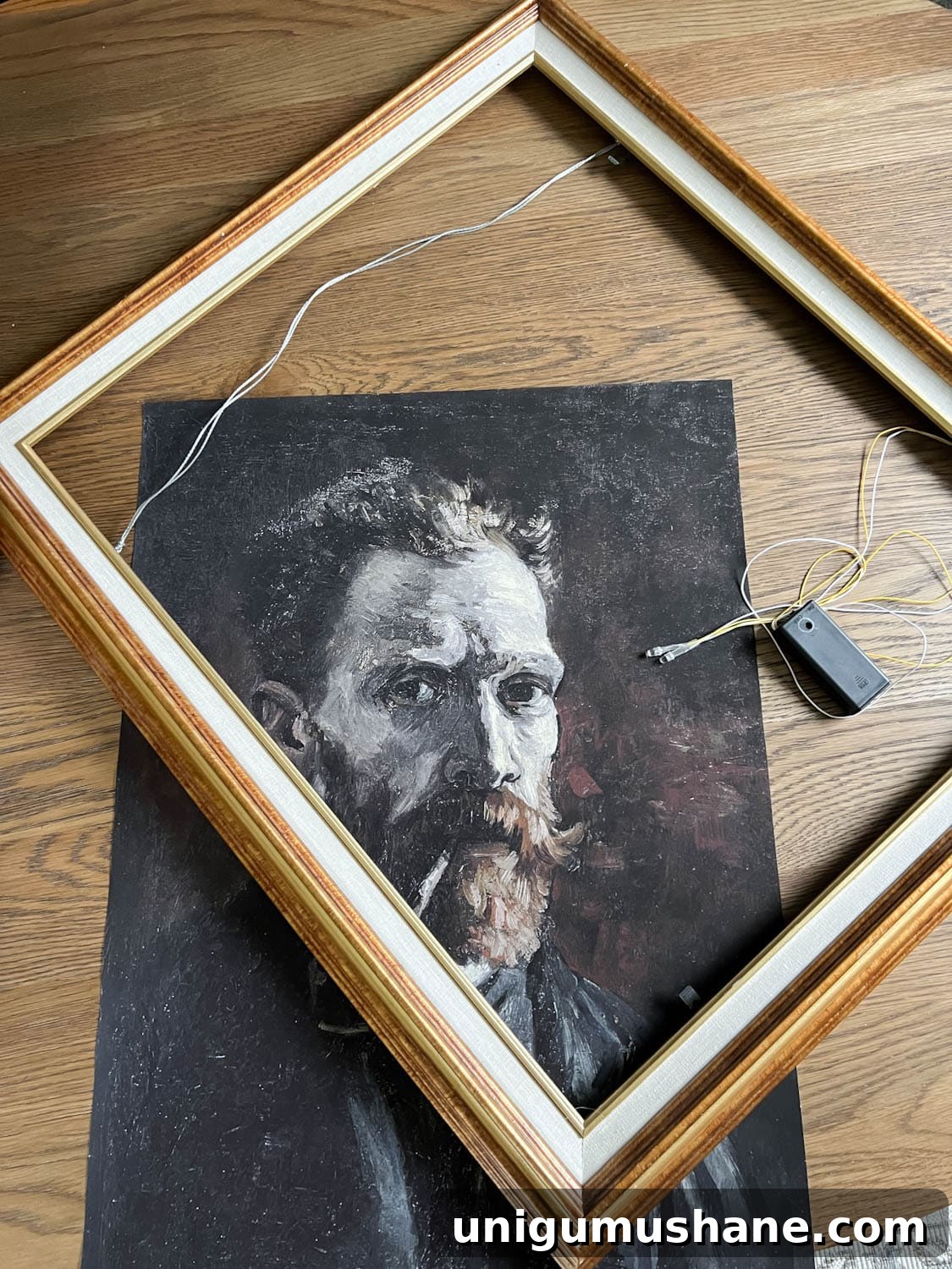 DIY Spooky Halloween Decor Using a Thrifted Picture Frame 3 thrifted picture frame, art print, and battery operated lights