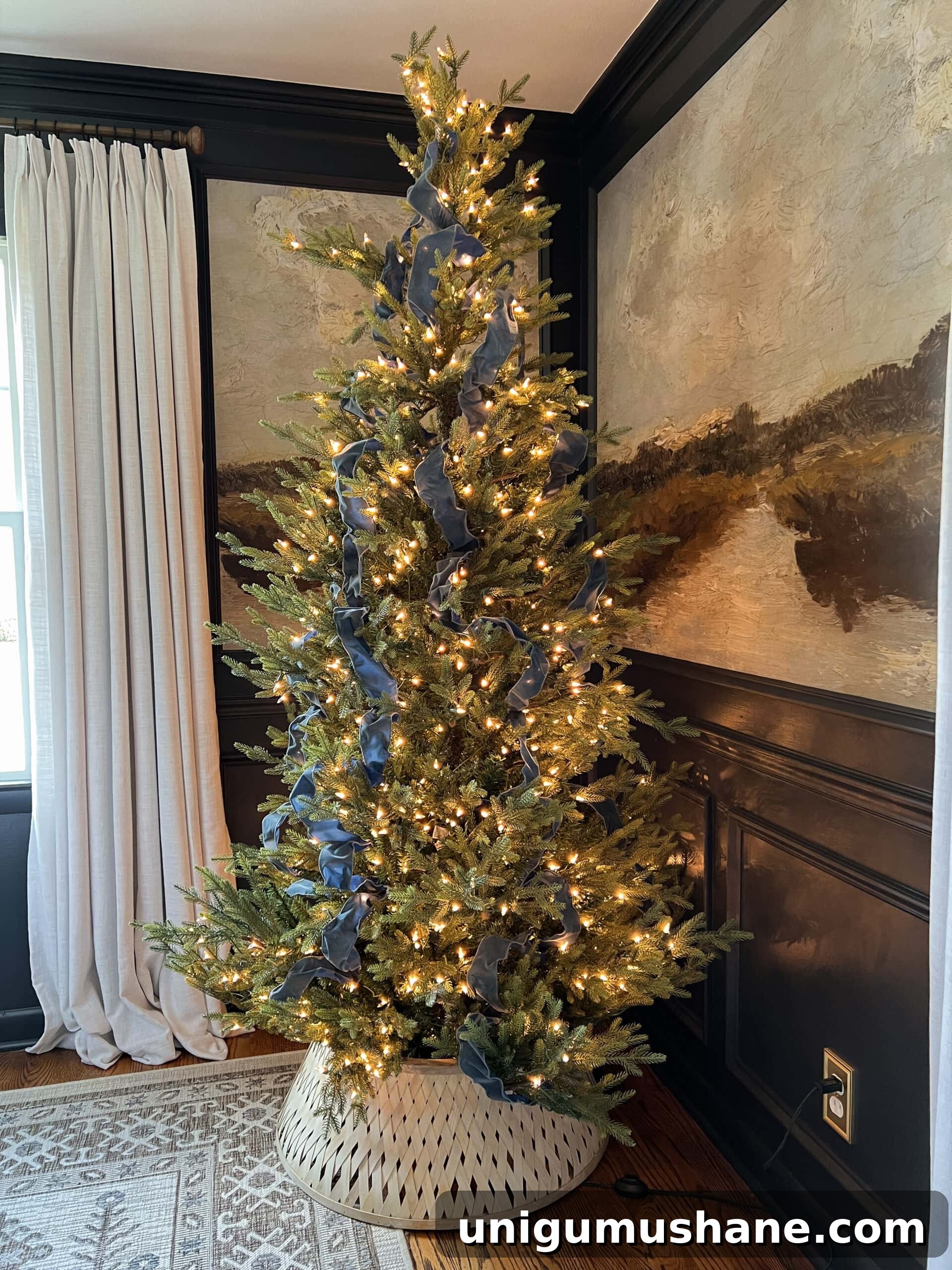 How to Add Ribbon Decorations to Your Christmas Tree 10 Christmas tree decorated with antique blue ribbon