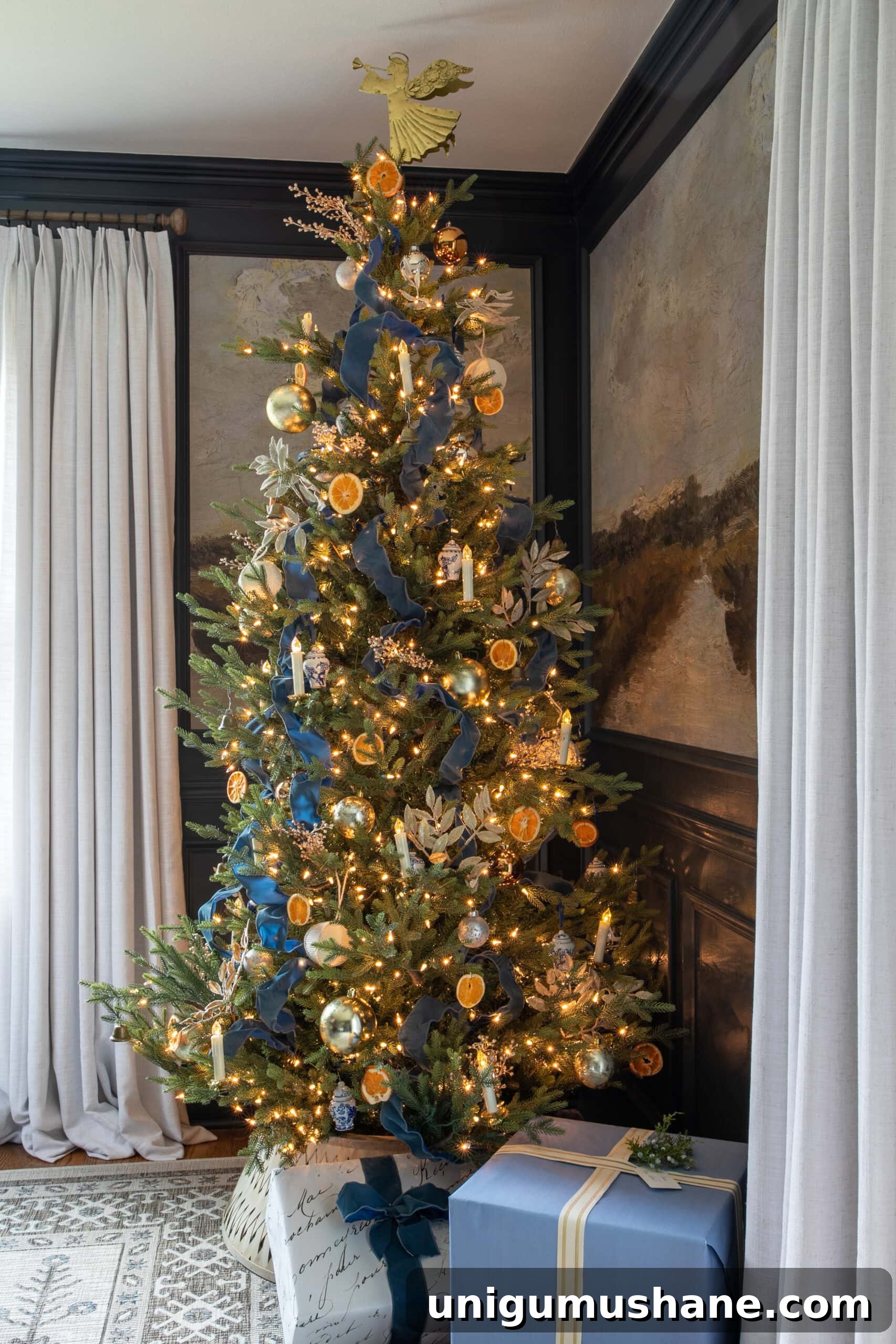 How to Add Ribbon Decorations to Your Christmas Tree 19 blue tree ribbon with dried oranges and gold ornaments