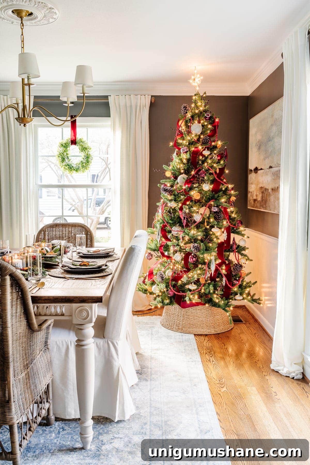 How to Add Ribbon Decorations to Your Christmas Tree 21 burgundy waterfall ribbon christmas tree in a dining room
