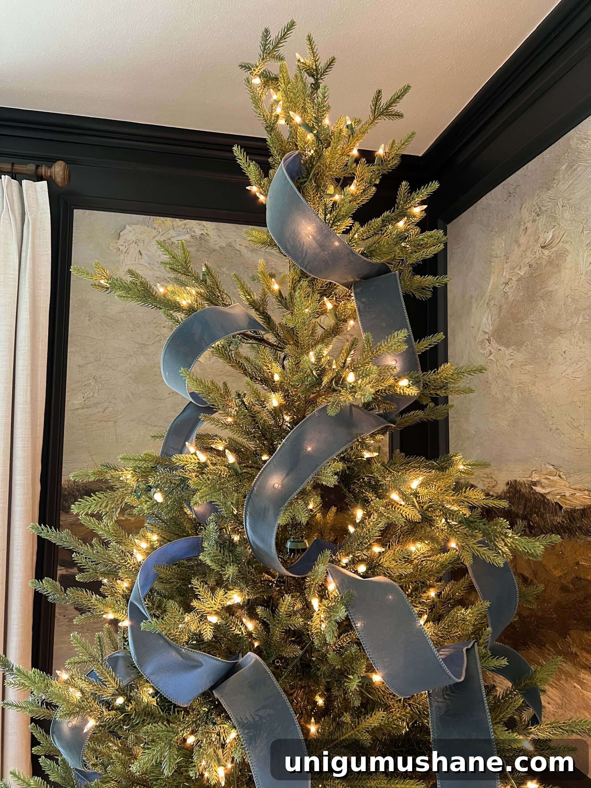 How to Add Ribbon Decorations to Your Christmas Tree 9 how to do the waterfall ribbon christmas tree method