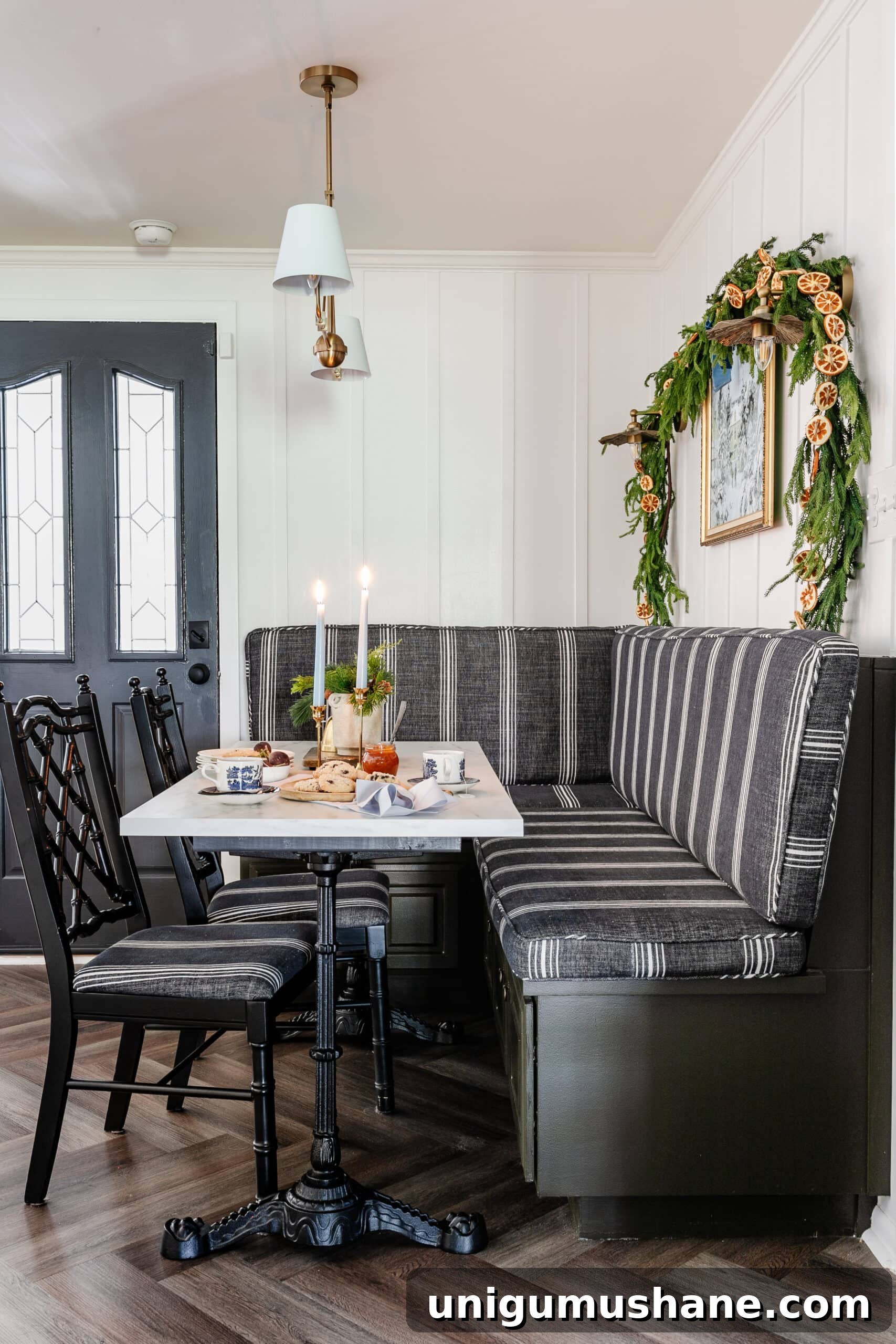 Free Winter Art Printable You Can Frame Anywhere 8 breakfast nook with banquette and kitchen table decorated for Christmas with vase of winter stems