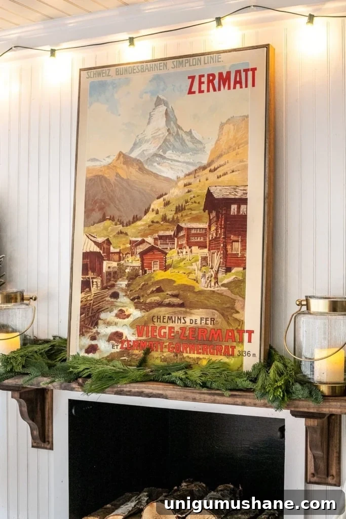 18 Christmas Wall Decor Ideas with Holiday Art Printables 12 Christmas art made from covering old art on a canvas with a poster of a mountain scene