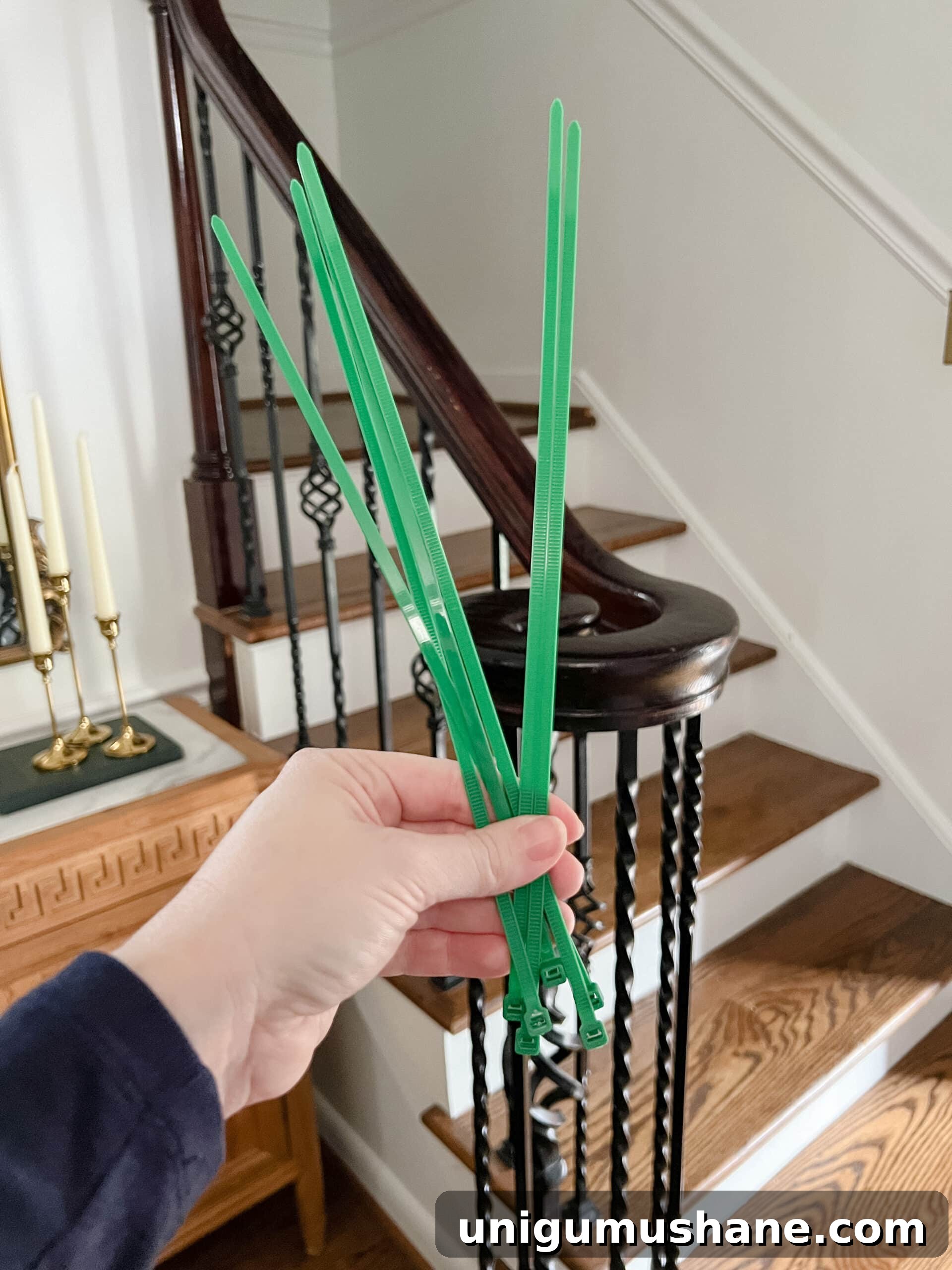 zip ties used for hanging garland on banister