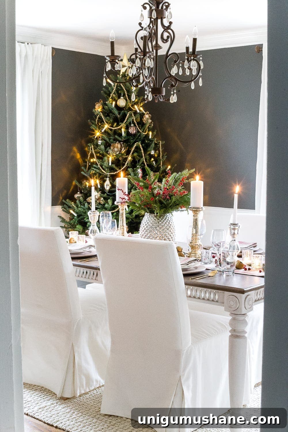 real Christmas tree in a dining room decorated with mercury glass