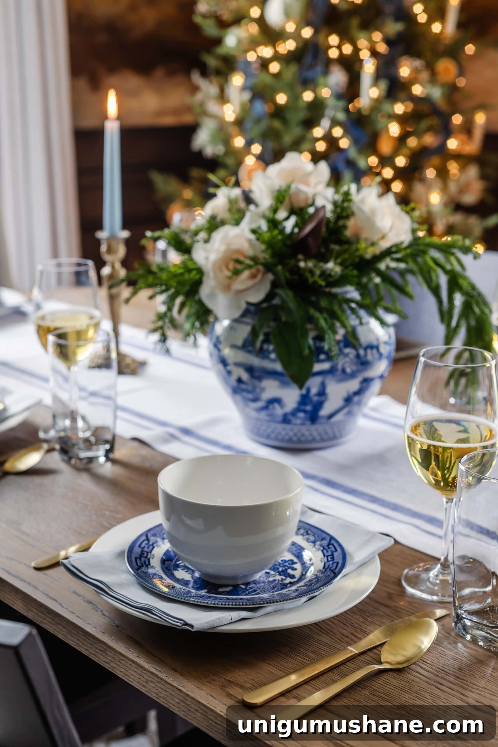 white and blue Christmas dinner table place setting