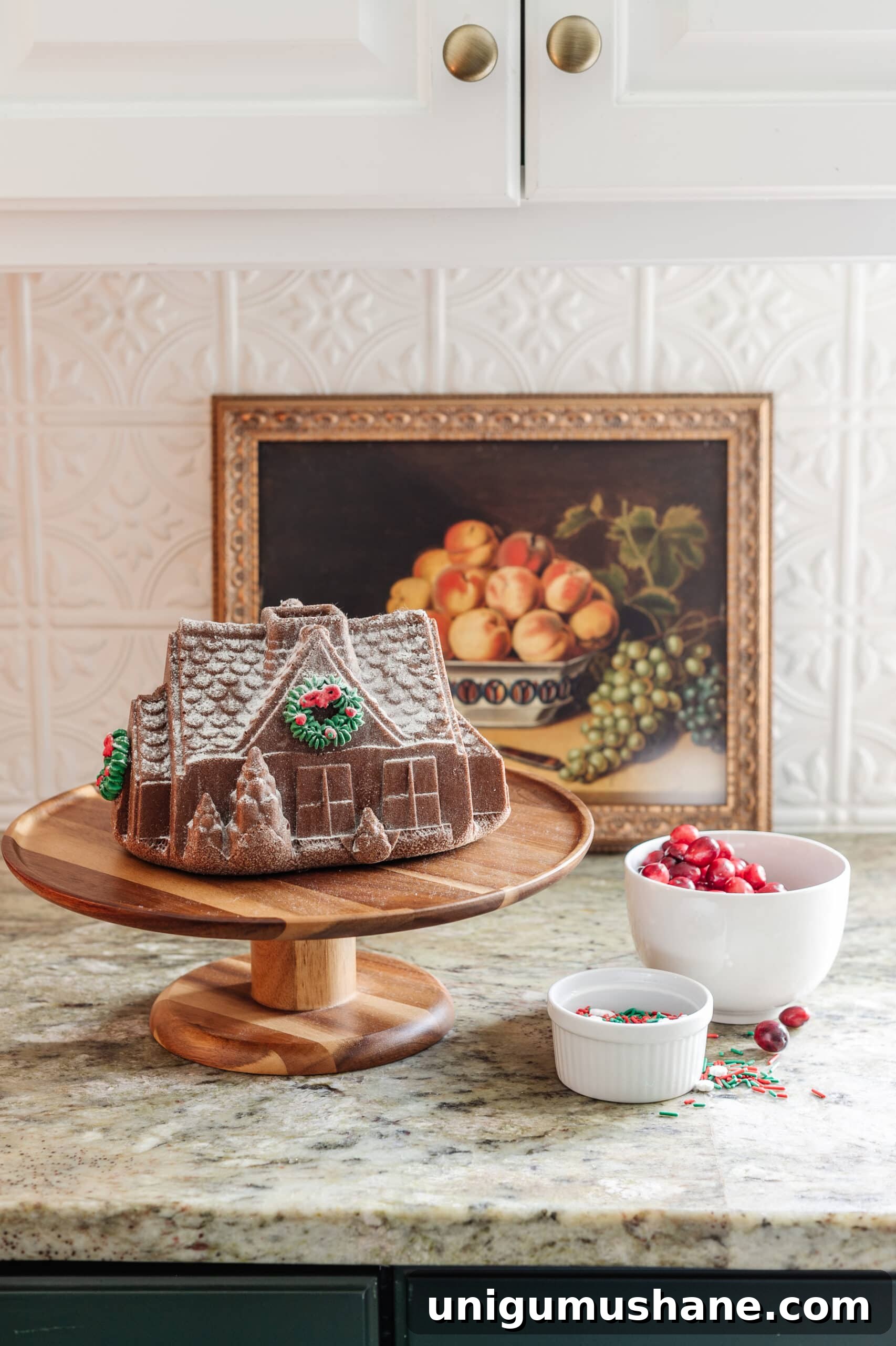 9 Quick Ways to Decorate Your Kitchen for Christmas 9 countertop kitchen Christmas decor using a fake gingerbread house