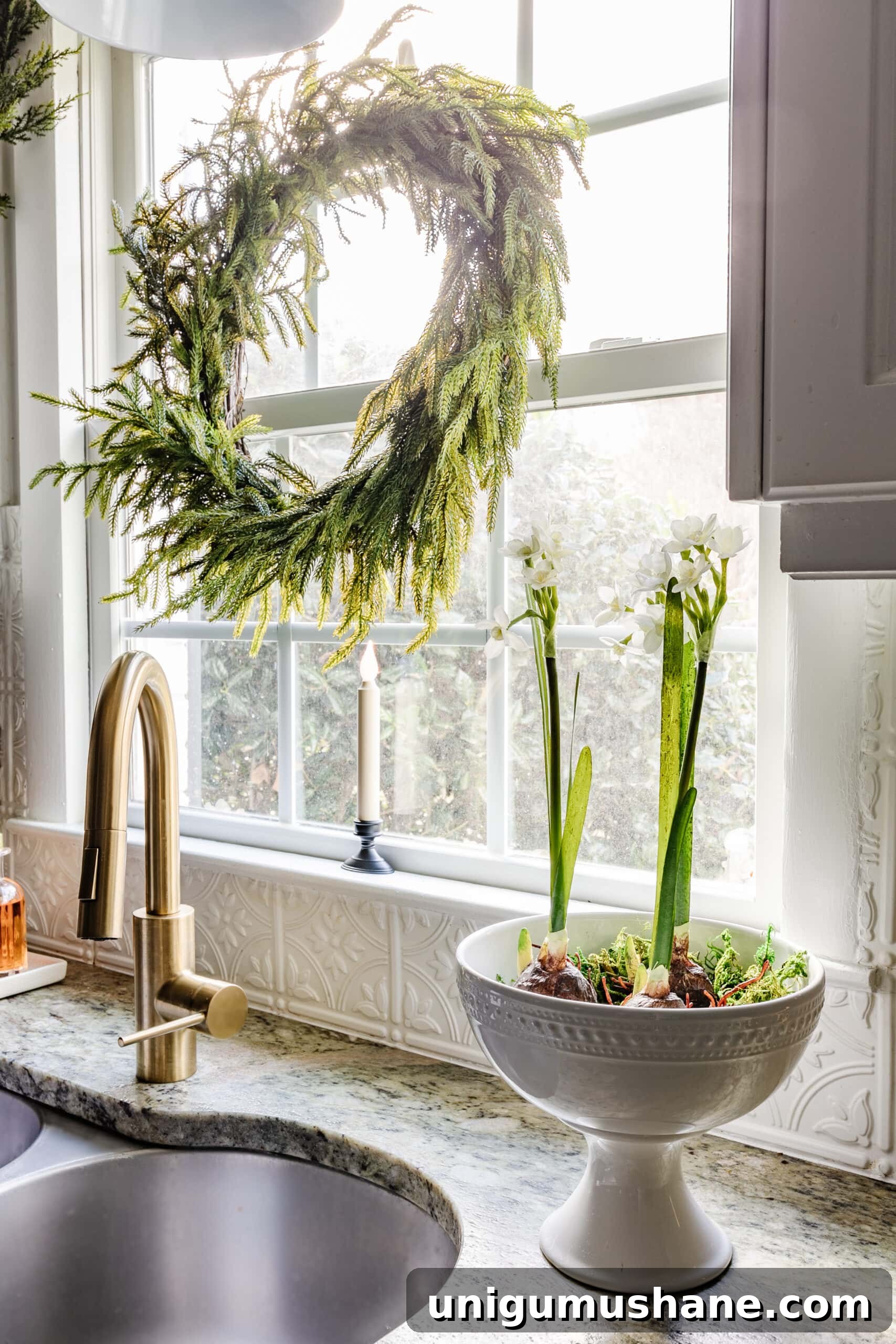 9 Quick Ways to Decorate Your Kitchen for Christmas 6 pedestal bowl of paperwhite flowers beside a kitchen sink