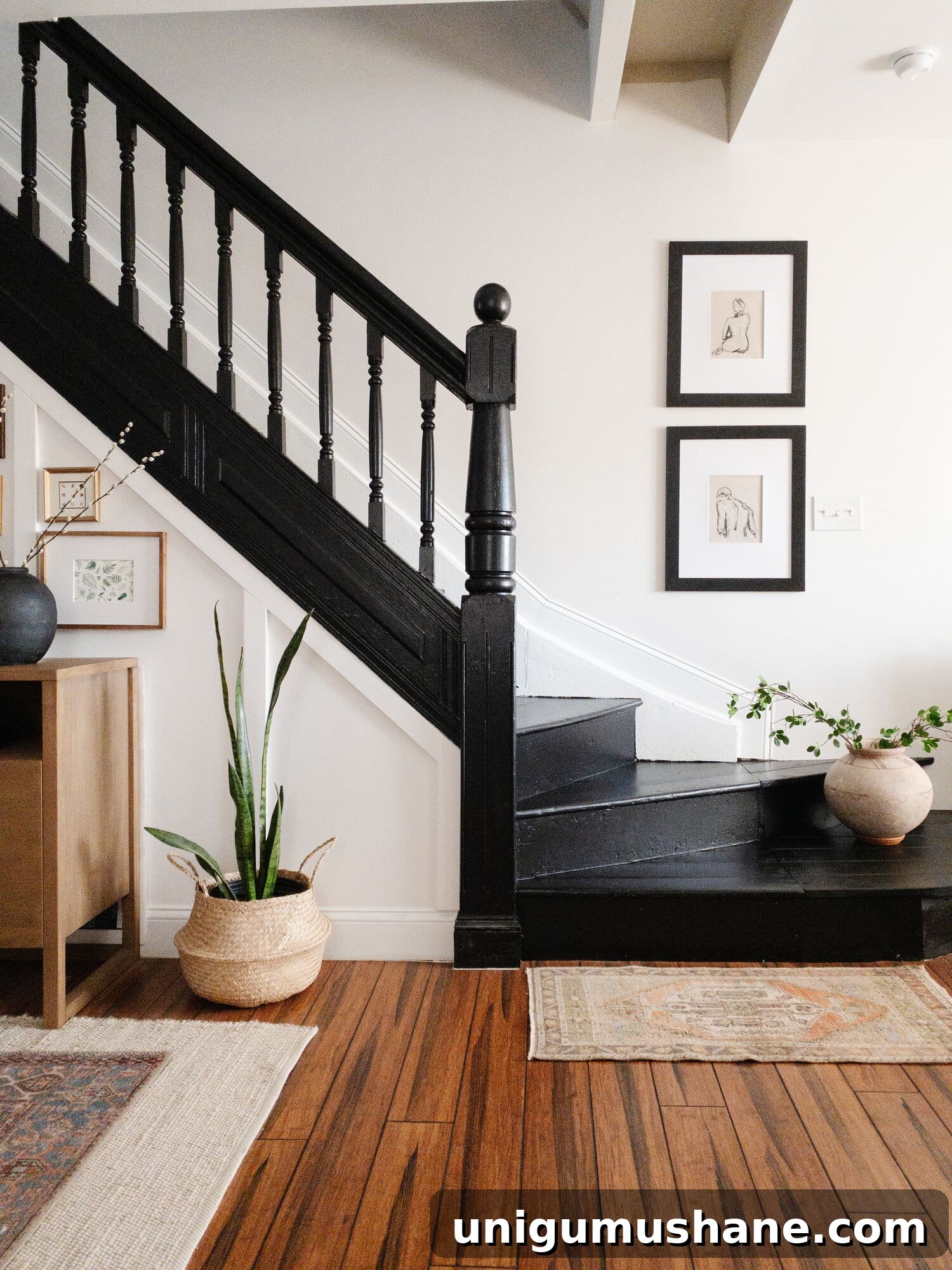 9 Black Stair Railing Ideas to Elevate Your Foyer 12 plain painted black stairs