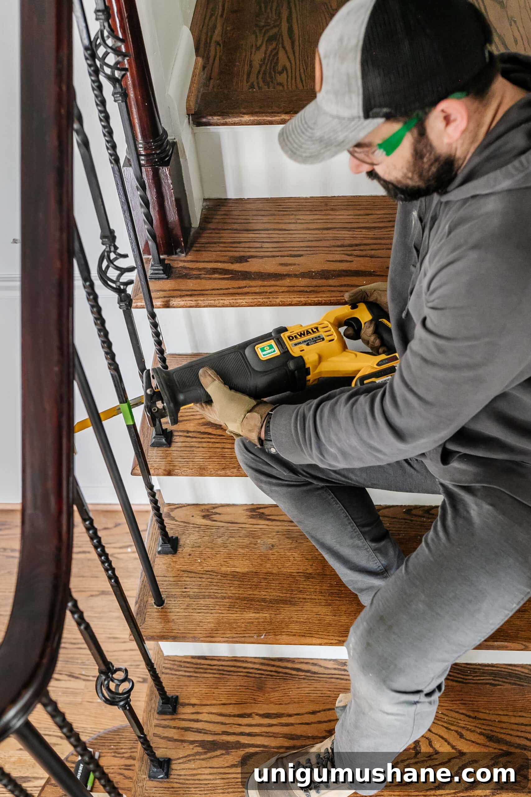 Replace Stair Spindles: DIY Staircase Makeover Guide 4 cutting wrought iron stair spindles with a reciprocating saw