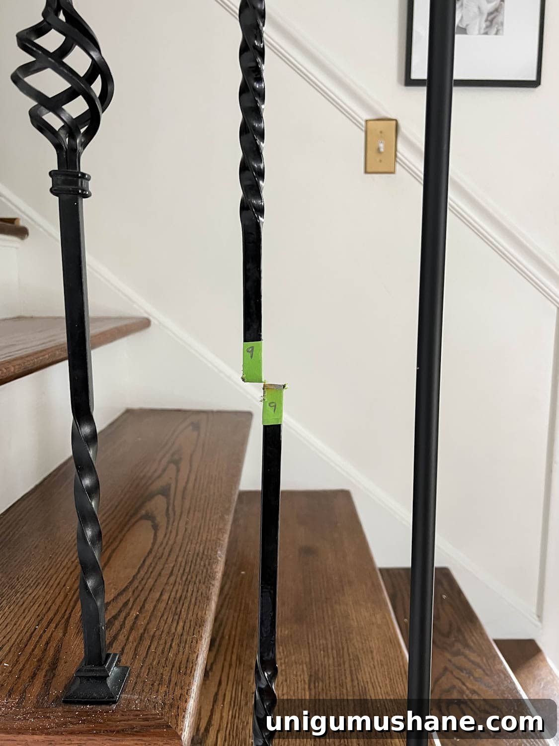 Replace Stair Spindles: DIY Staircase Makeover Guide 9 painters tape used to cut old stair balusters before removal