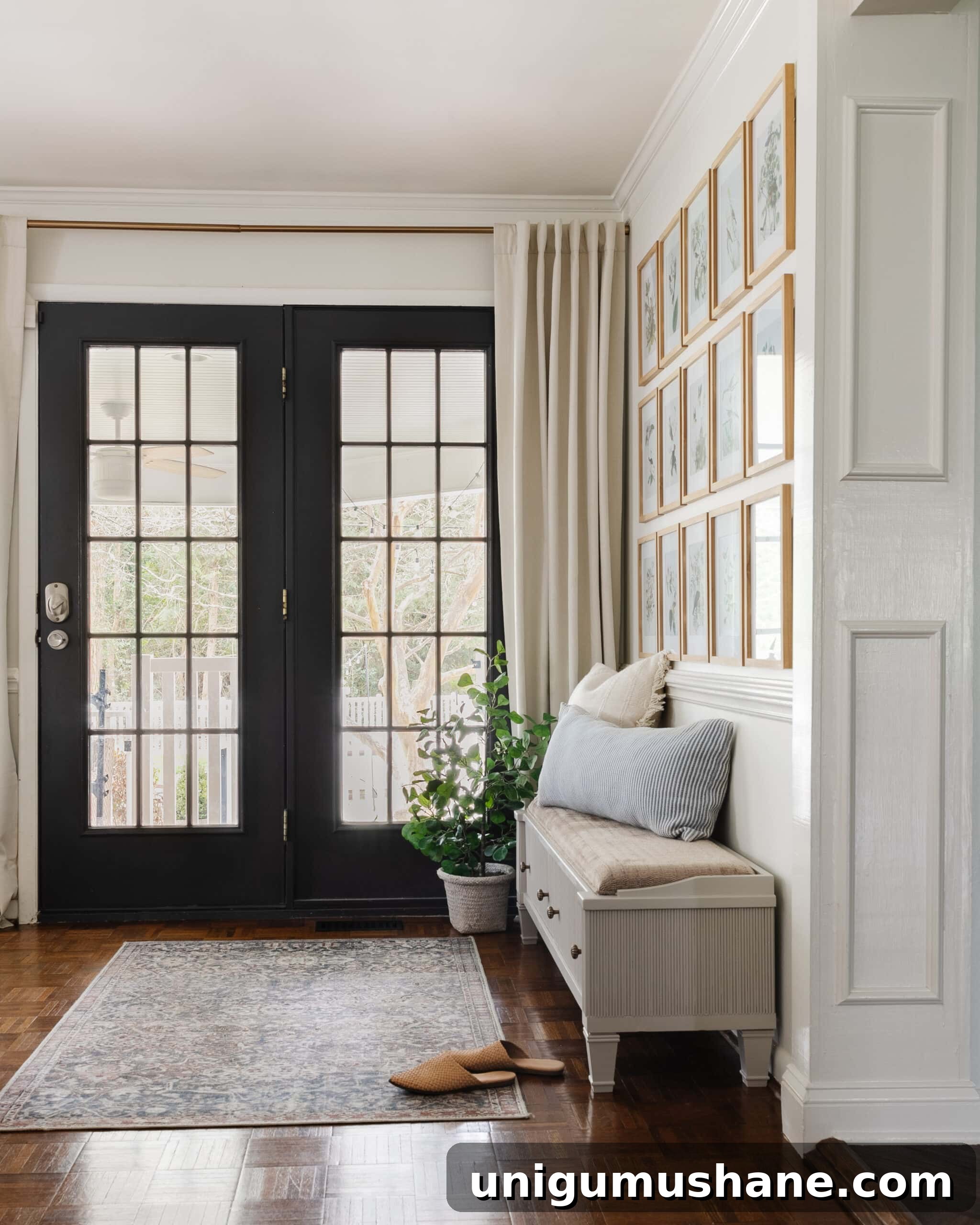 Transform a Shoe Storage Bench with Reeded Trim 2 reeded shoe storage bench in an entryway with black doors and gallery wall