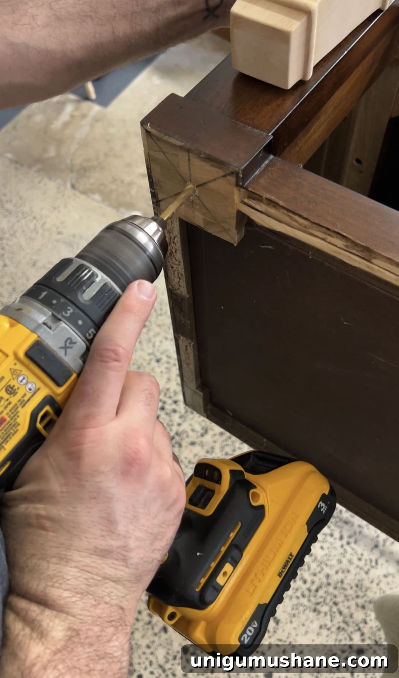 Transform a Shoe Storage Bench with Reeded Trim 10 drilling to add new furniture legs