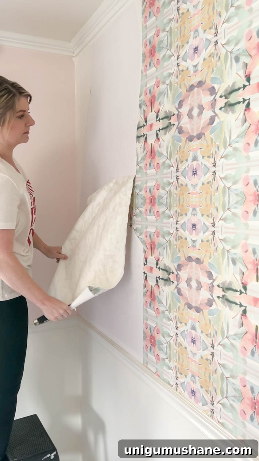 How to Remove Wallpaper: 3 Tested Methods 11 removing wallpaper with store bought wallpaper stripper Piranha brand