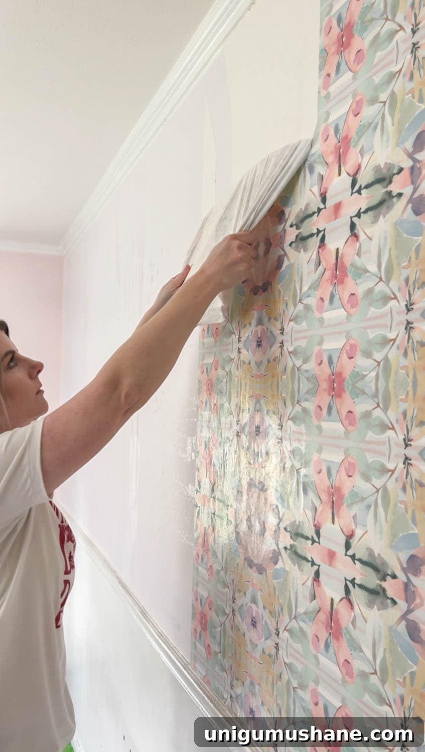 How to Remove Wallpaper: 3 Tested Methods 15 removing wallpaper sprayed with fabric softener