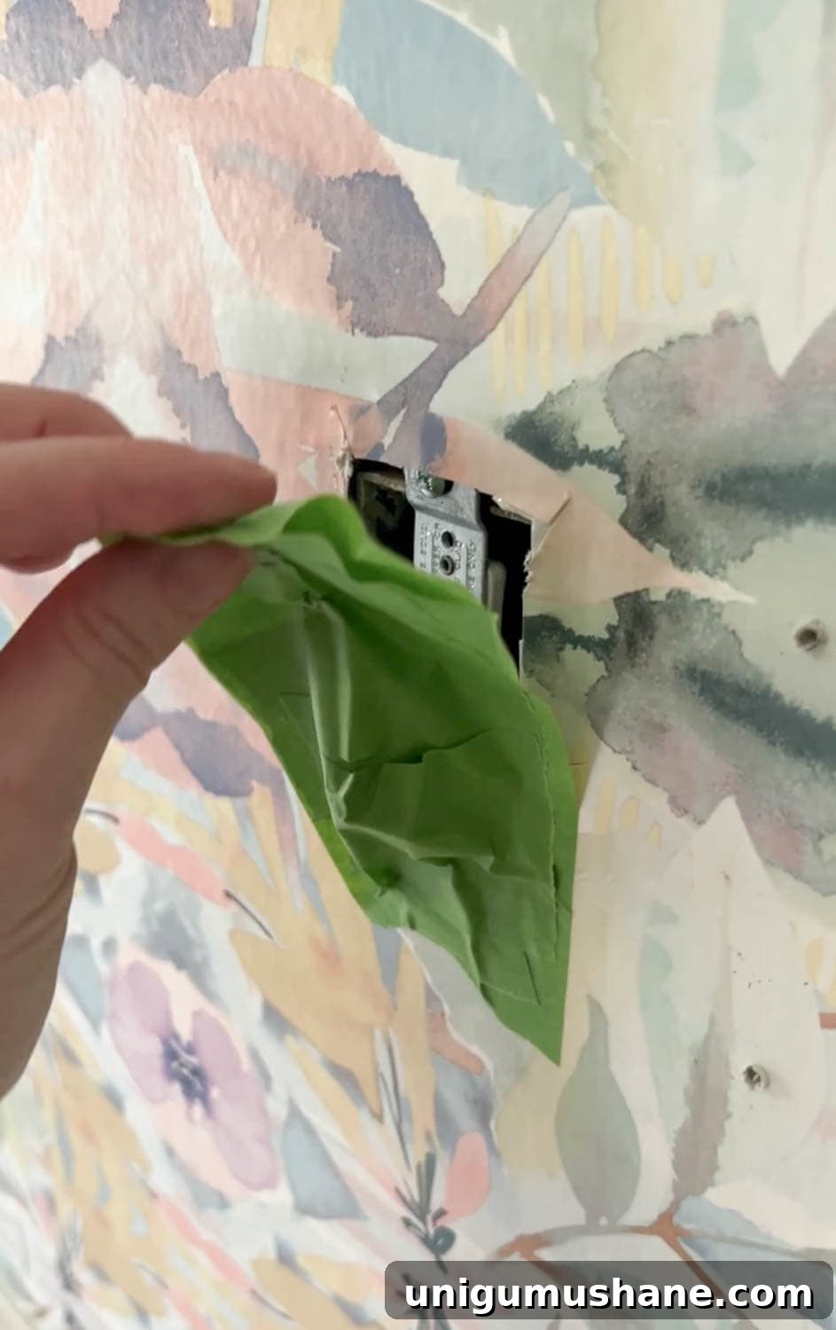 How to Remove Wallpaper: 3 Tested Methods 6 covering outlets before wallpaper removal to protect wires