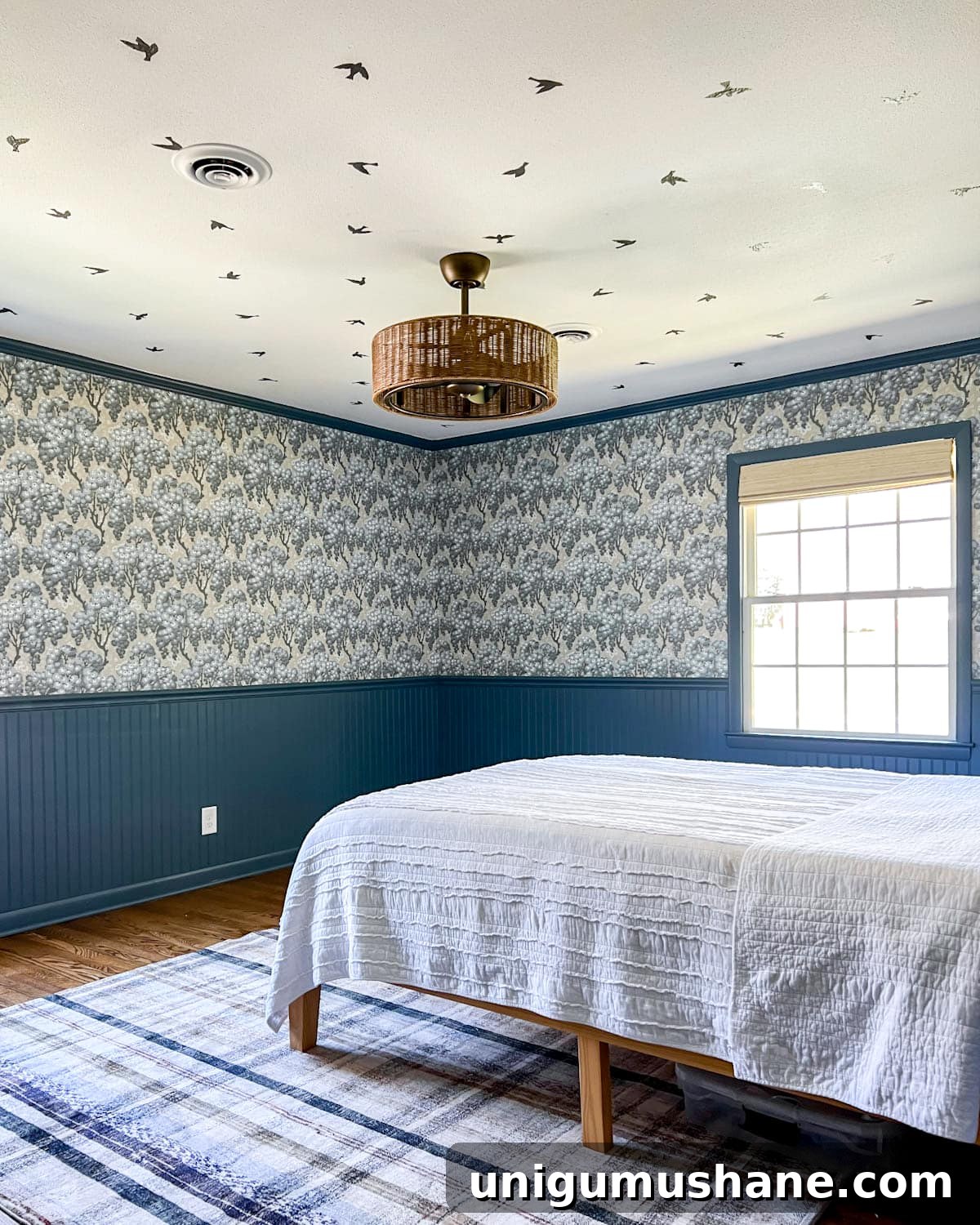 DIY bird wallpaper ceiling in a bedroom using vinyl sticker decals