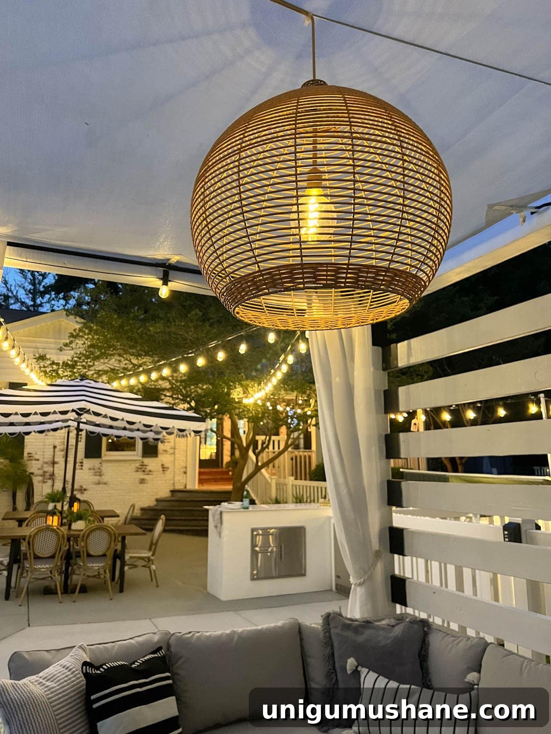 41 Budget-Friendly Backyard Projects for Outdoor Living 4 solar pendant light in outdoor dining area
