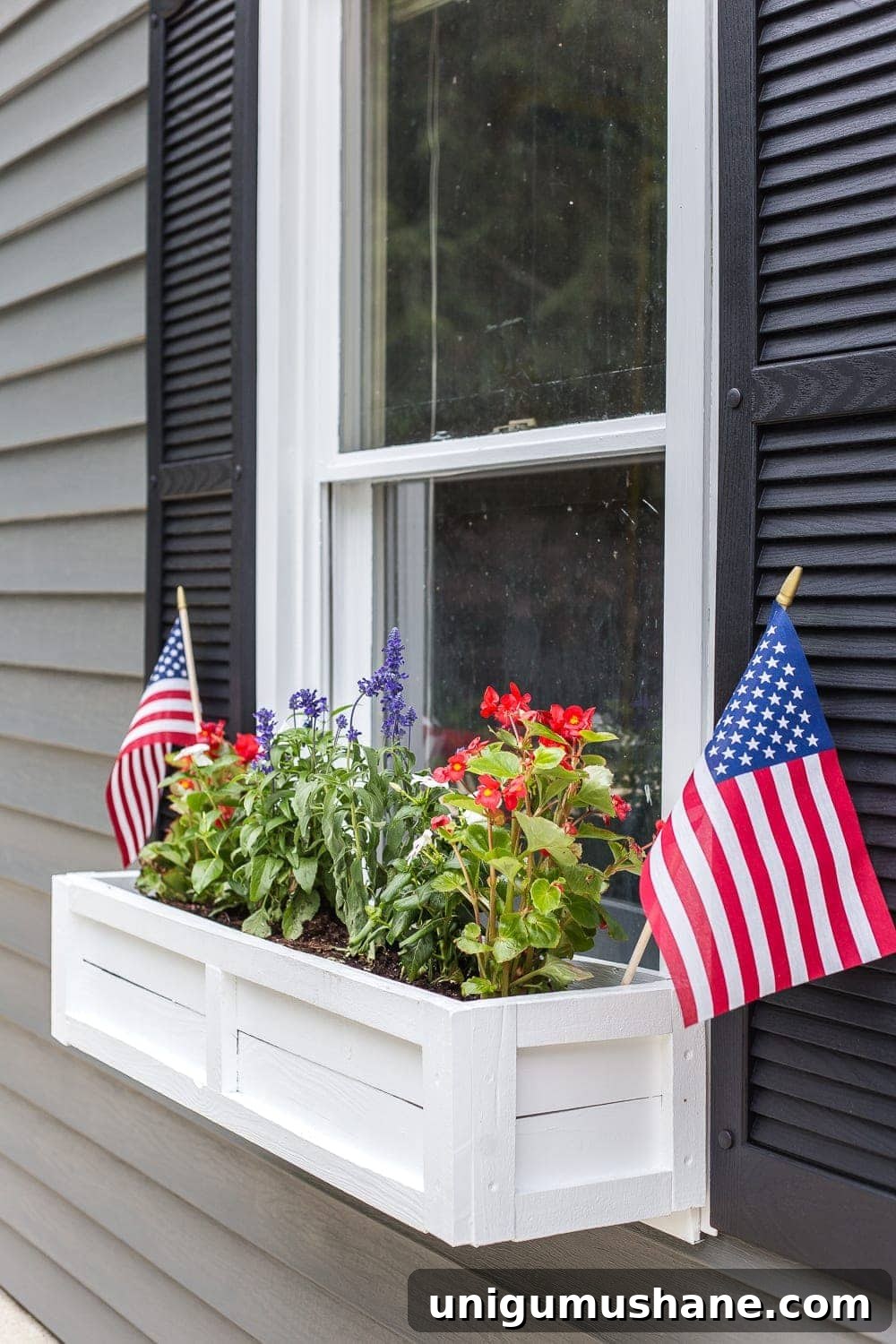 41 Budget-Friendly Backyard Projects for Outdoor Living 37 window box with flowers and July 4th decor