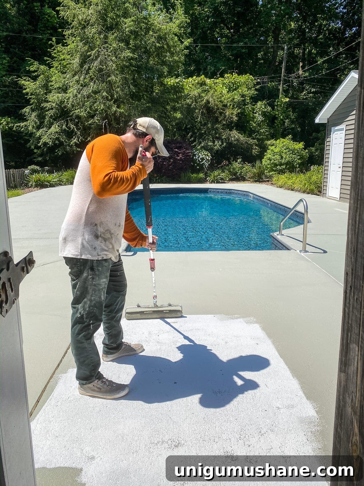 41 Budget-Friendly Backyard Projects for Outdoor Living 6 DIY Painted Concrete Pool Deck and Patio