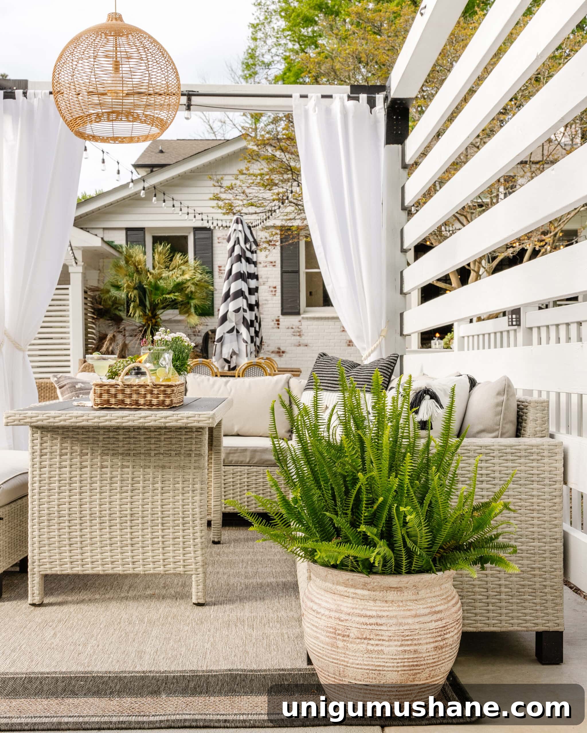 Spring Cleaning Checklist for Your Backyard Patio 17 Walmart patio furniture in a DIY backyard pool cabana pergola with a potted fern