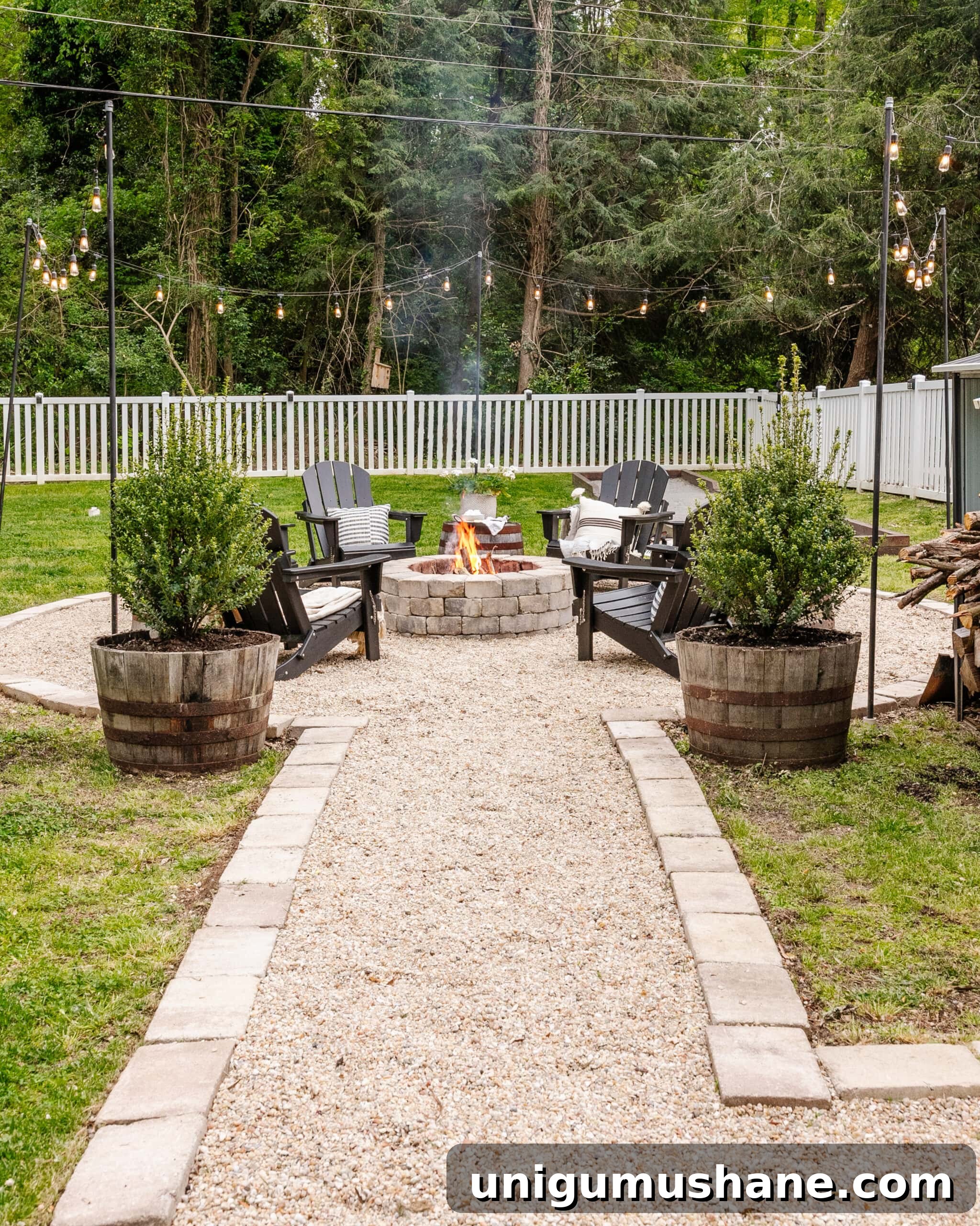 Spring Cleaning Checklist for Your Backyard Patio 3 stone fire pit with pea gravel sitting area and adirondack chairs