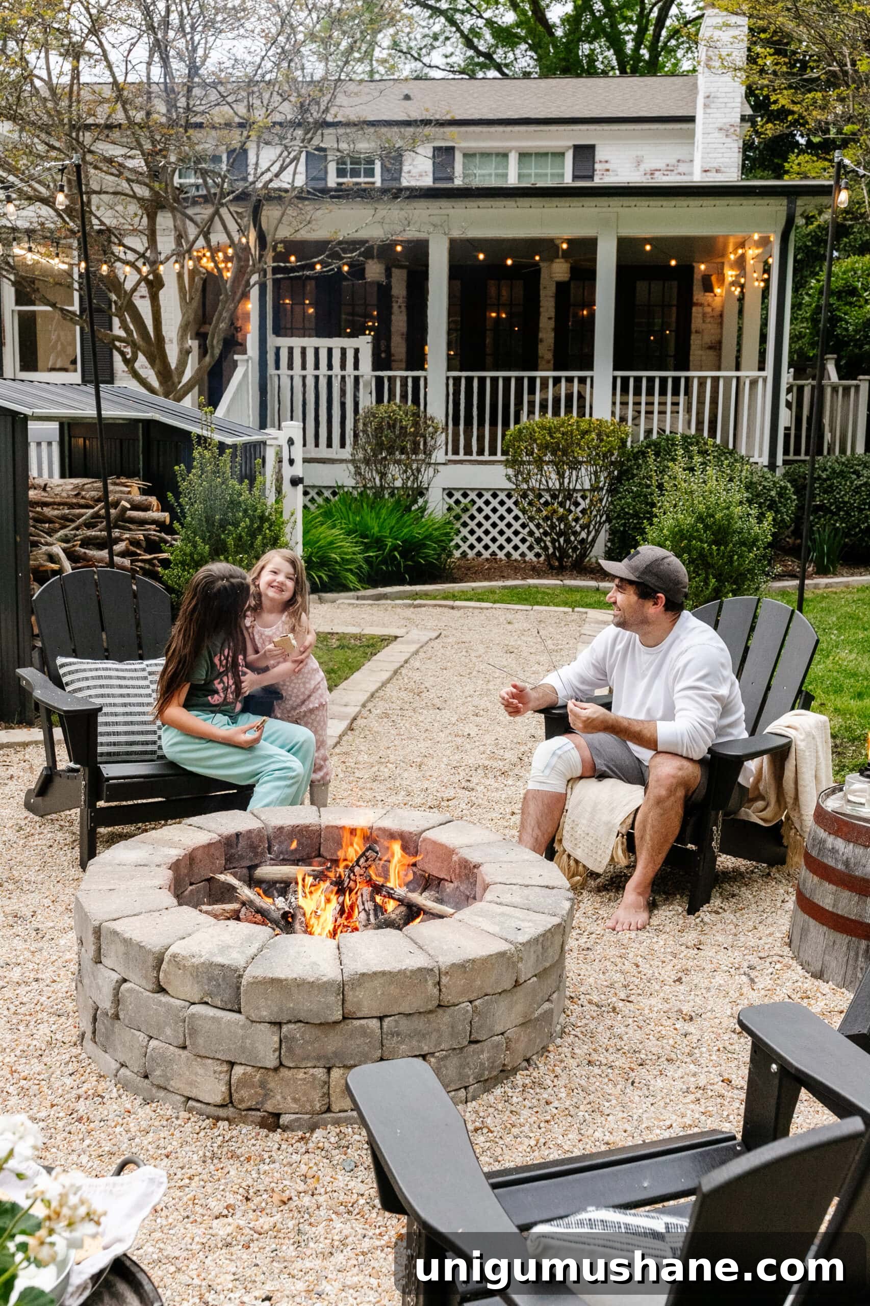 Spring Cleaning Checklist for Your Backyard Patio 23 family sitting around a backyard fire pit