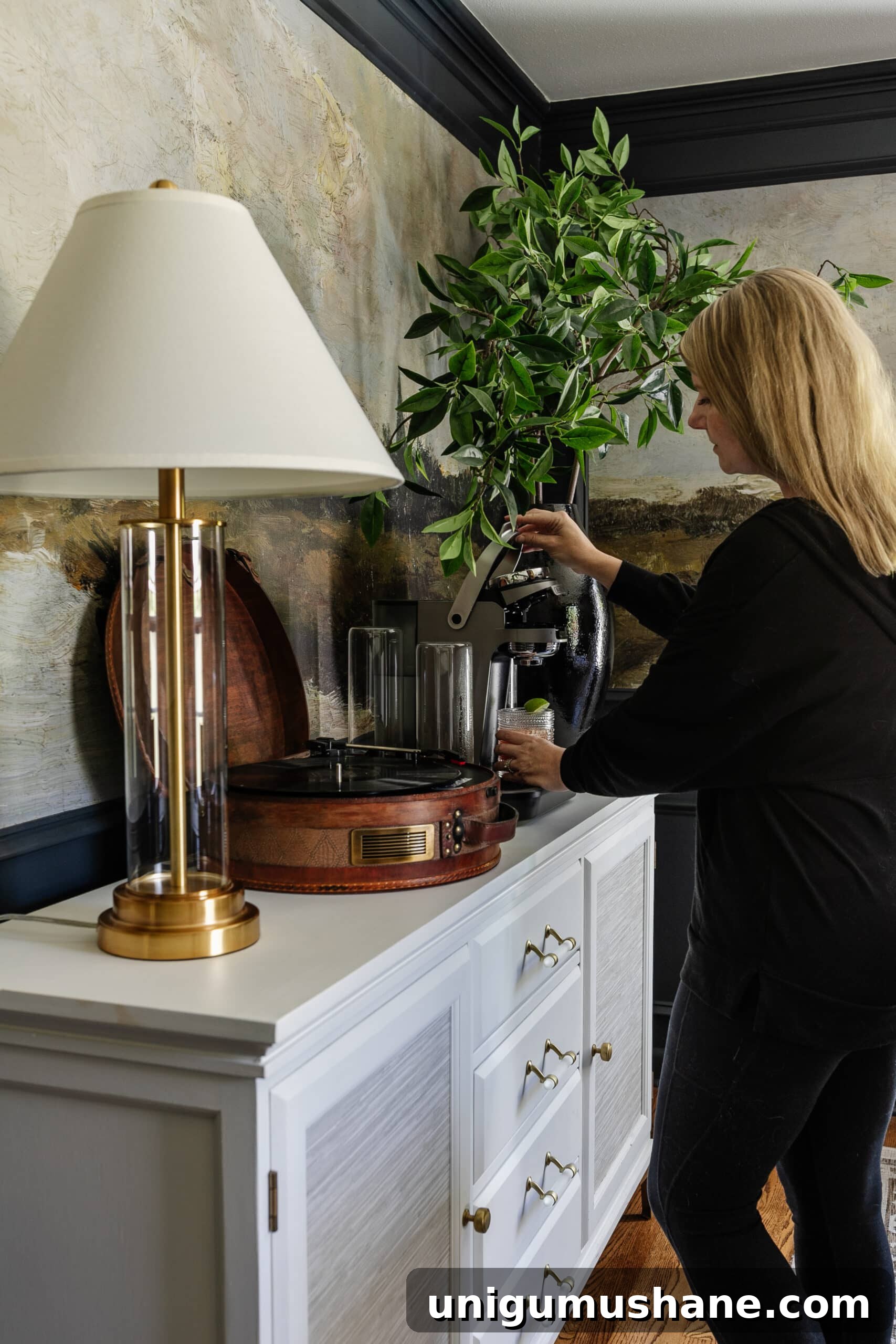 Bartesian Cocktail Maker Review: Unbiased Hands-On Verdict 2 using a Bartesian cocktail maker in a dining room for hosting