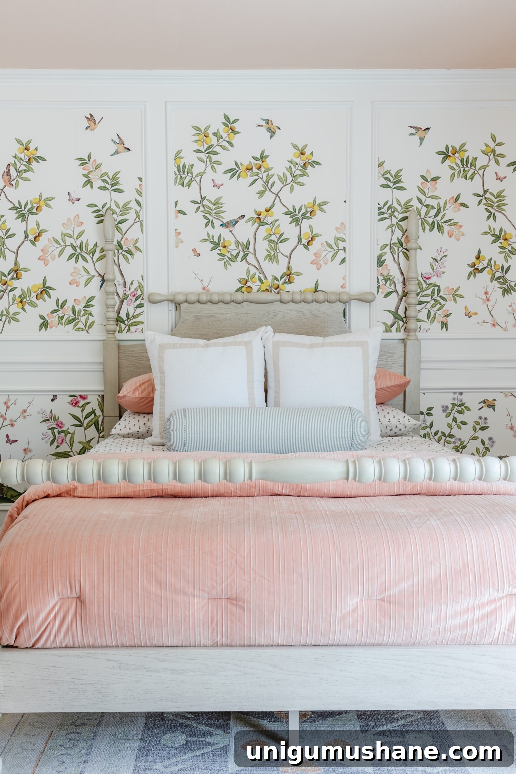 little girls bedroom with pink bedding and chinoiserie wallpaper