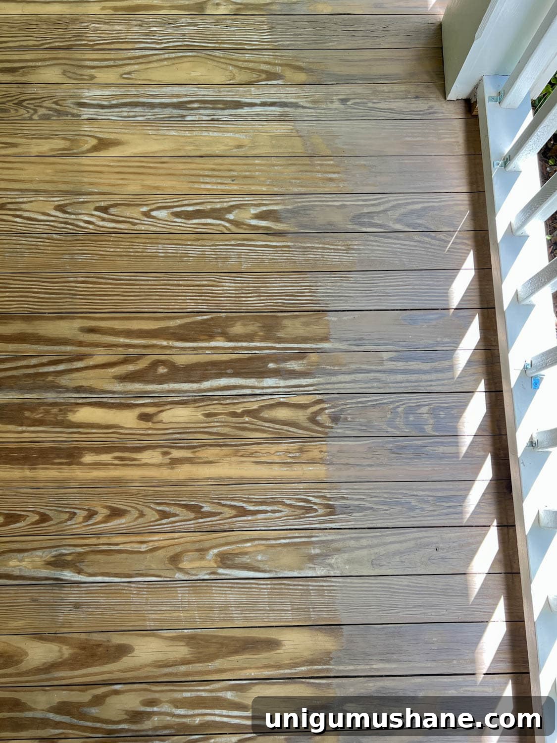 How to Get a Neutral Driftwood Look with Deck Stain 8 brushing behr stain color taupe on old deck wood removing yellow from wood
