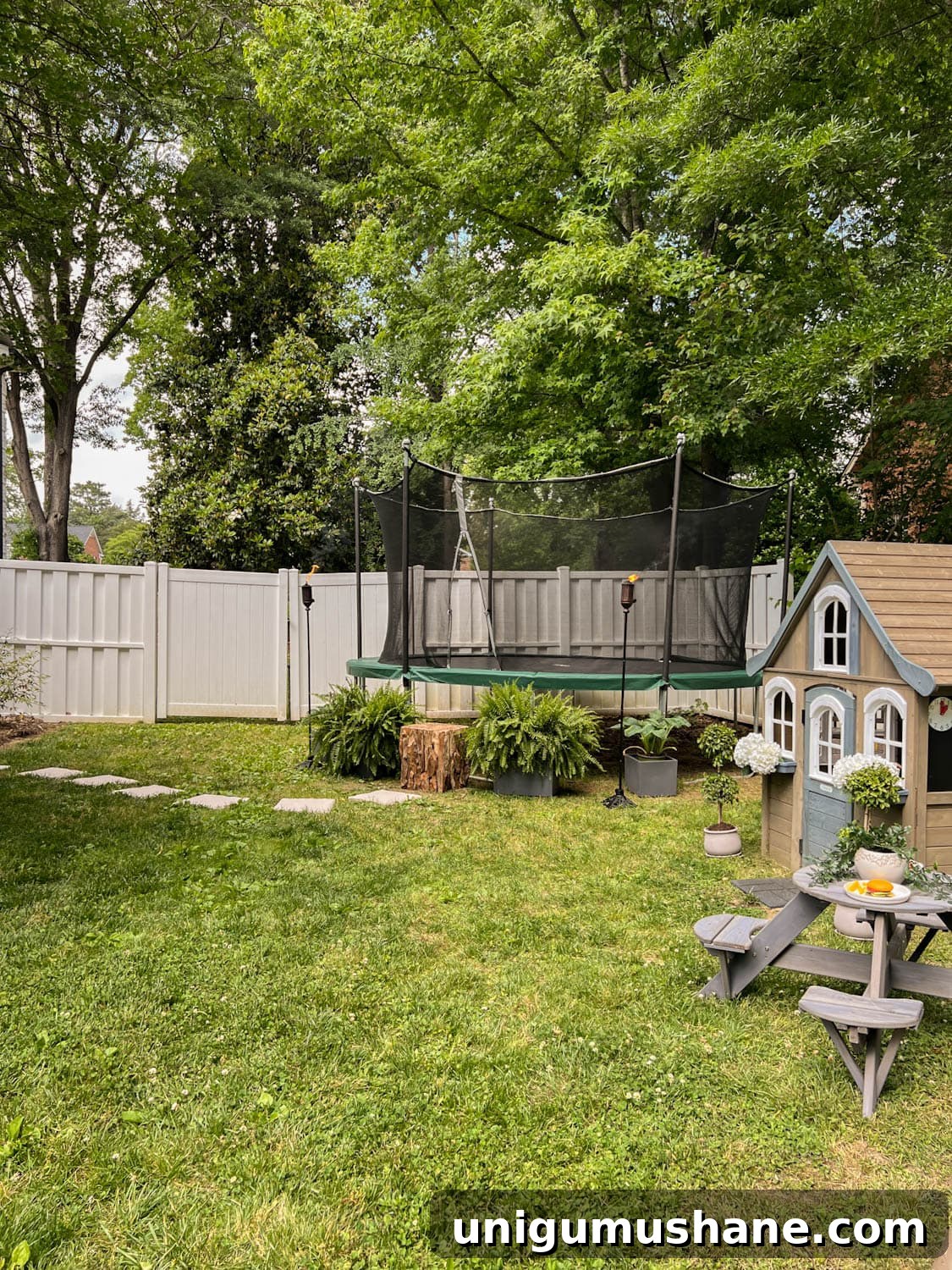 8 Side Yard Play Area Ideas and Trampoline Decor Tips 14 side yard with stepping stones leading to an outdoor trampoline