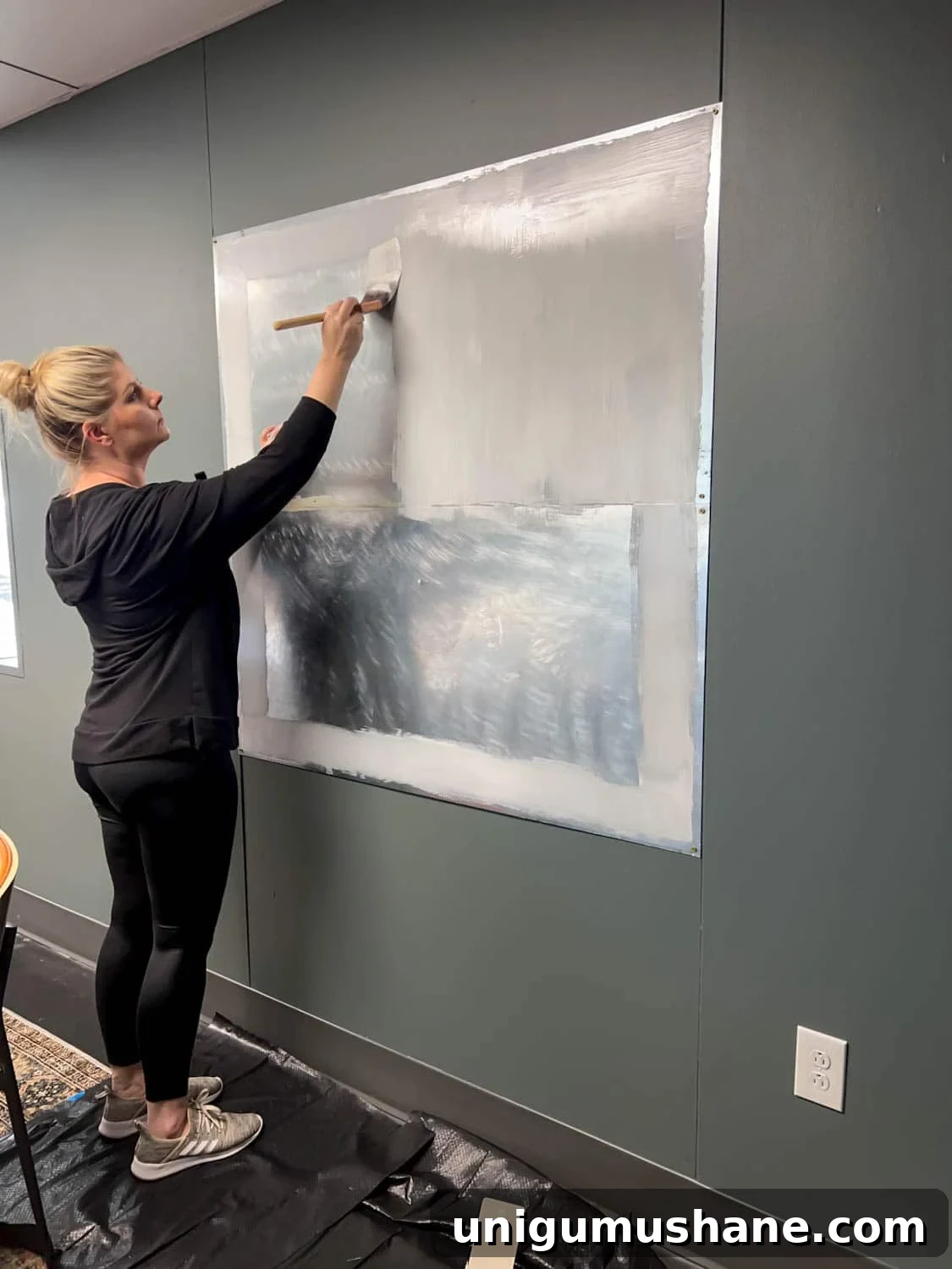 brushing sheet metal with oil based primer to apply wallpaper as a DIY art memo board