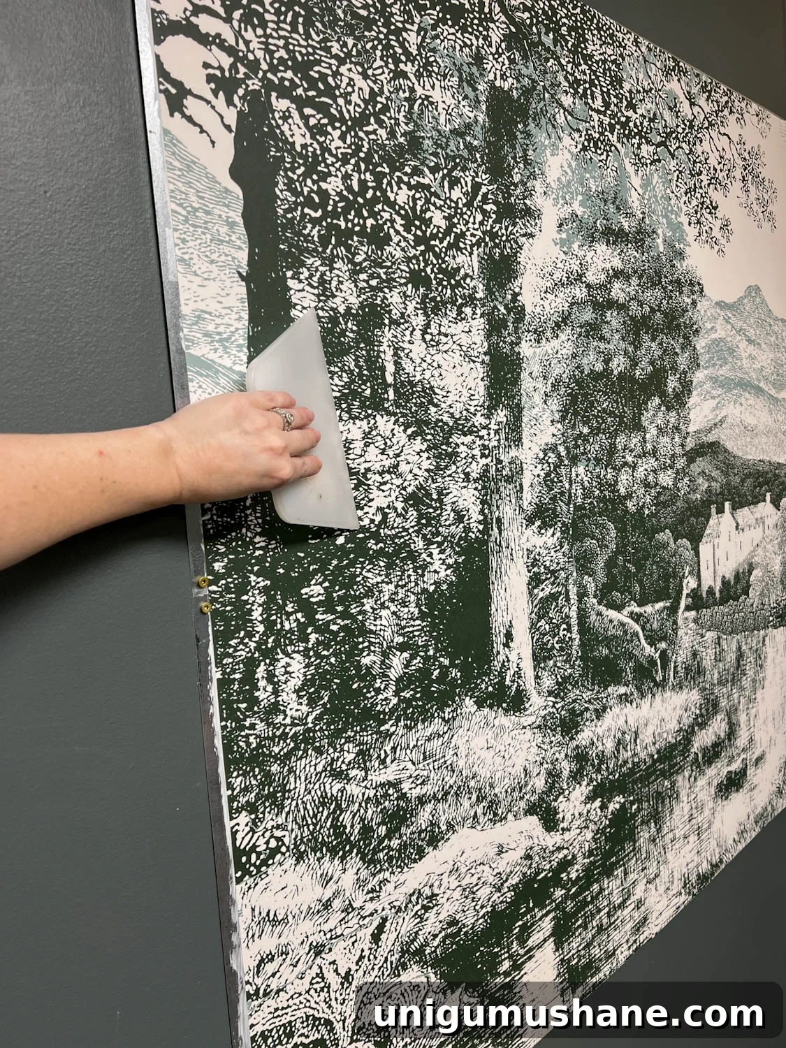 smoothing wall mural panels onto sheet metal 
