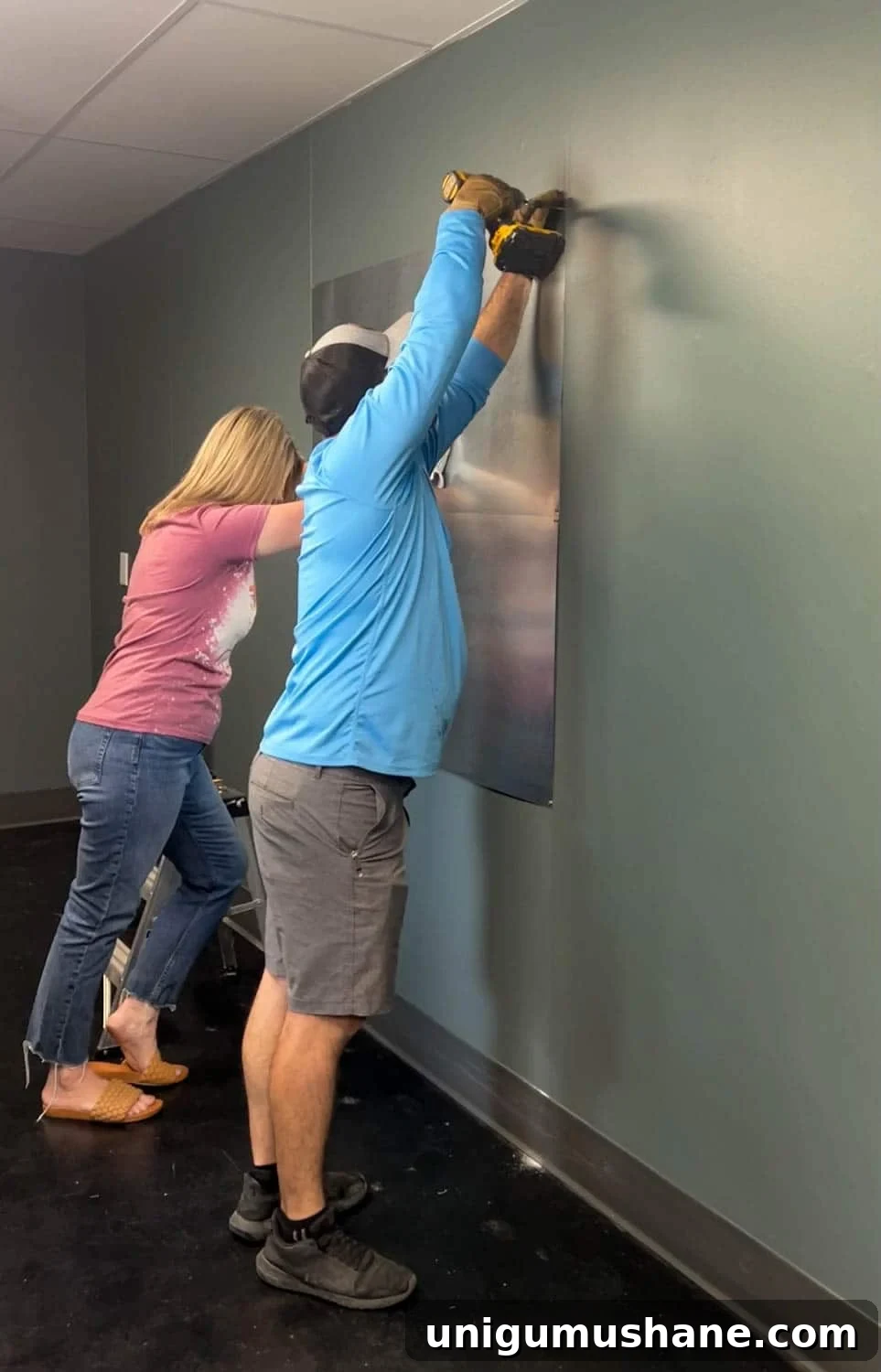 attaching sheet metal to a wall to make a DIY memo board