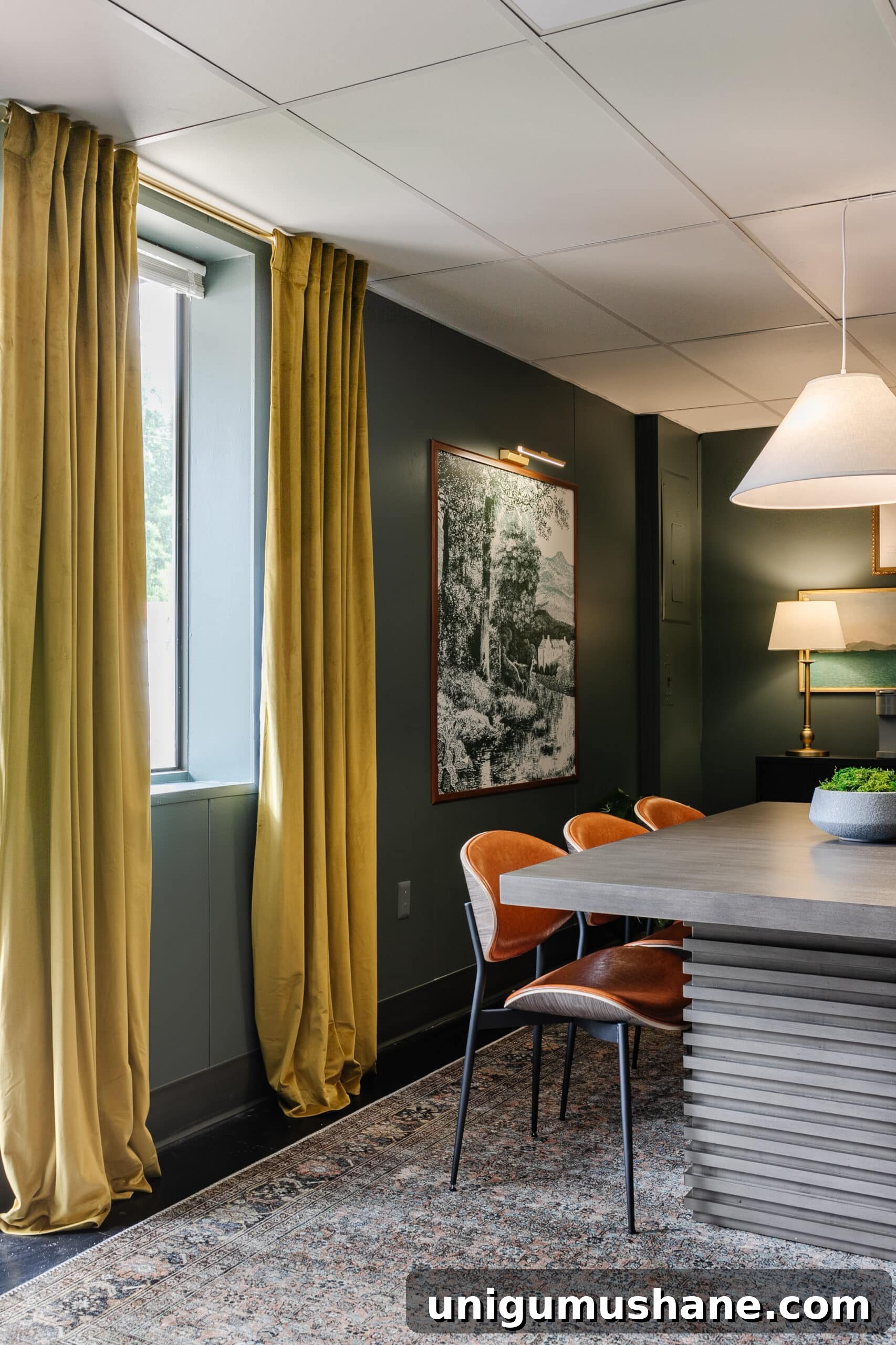 moss green curtains and teal walls in a conference room