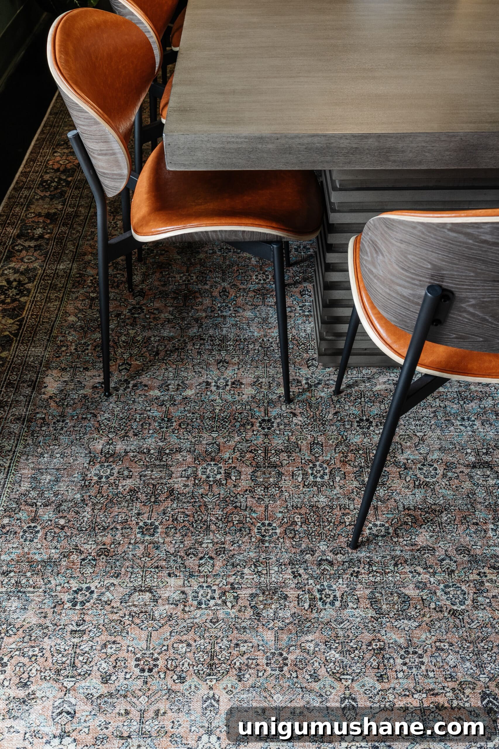 terracotta, teal, and moss green rug