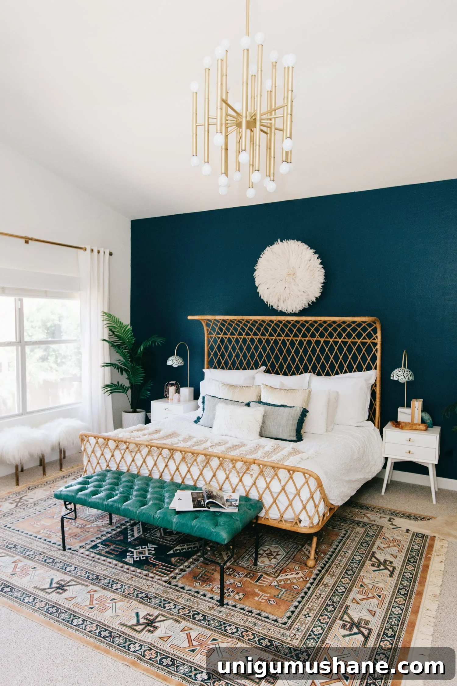 dark teal accent wall in a bedroom - Dunn Edwards Nocturnal Sea